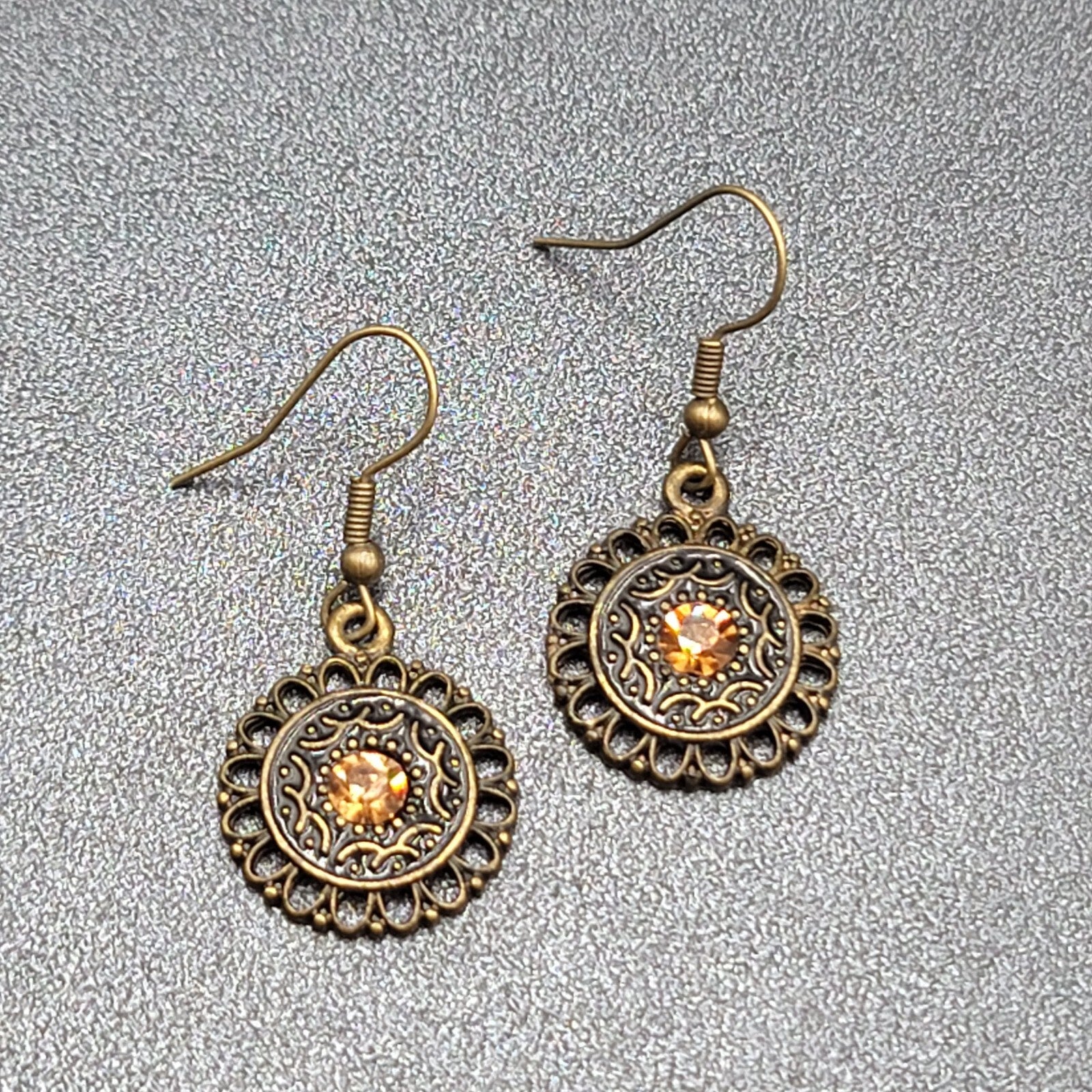Pierced Earrings Bronze tone Orange Rhinestone Round Filigree 7/8"
