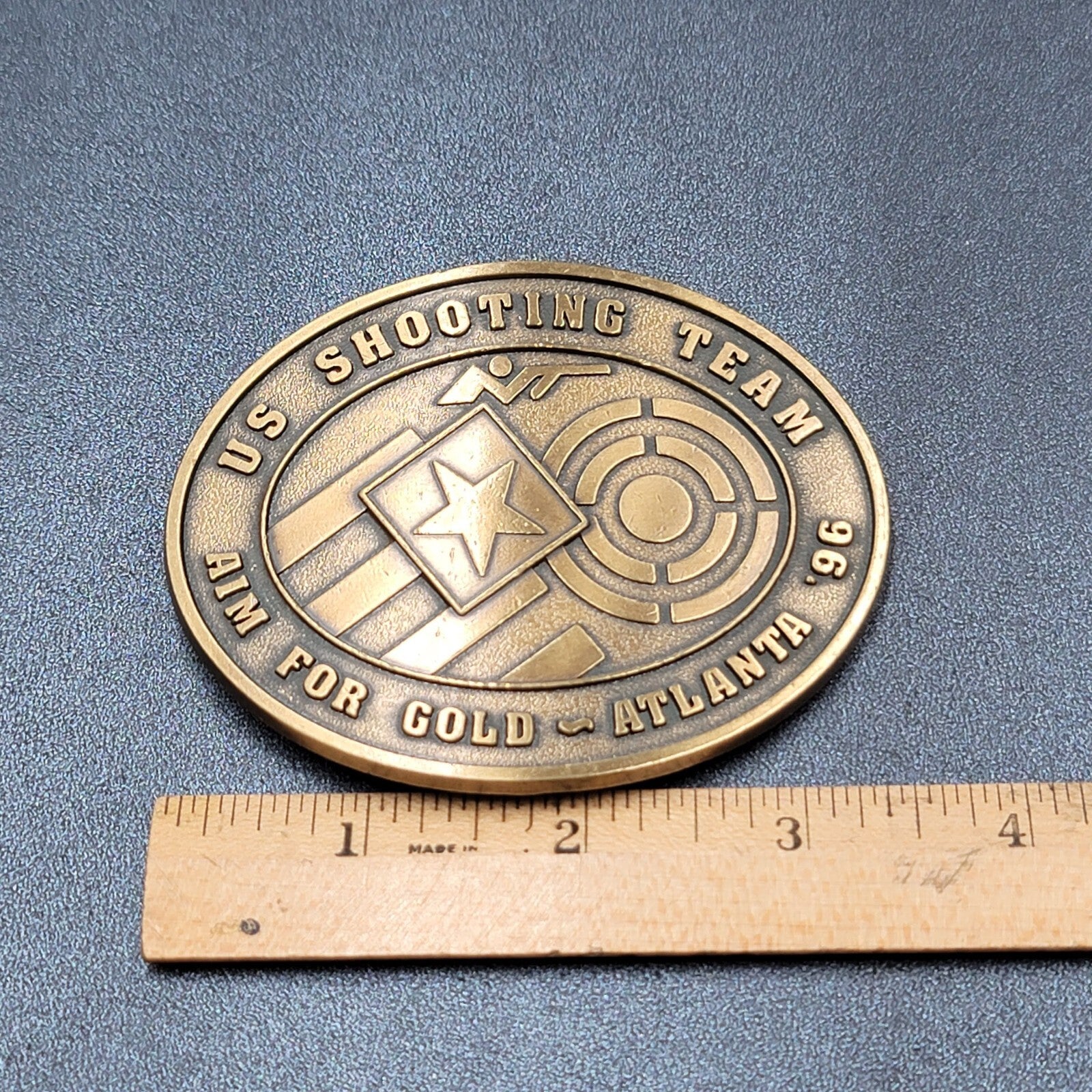 1996 US OLYMPICS ATLANTA SHOOTING TEAM BELT BUCKLE AIM FOR GOLD