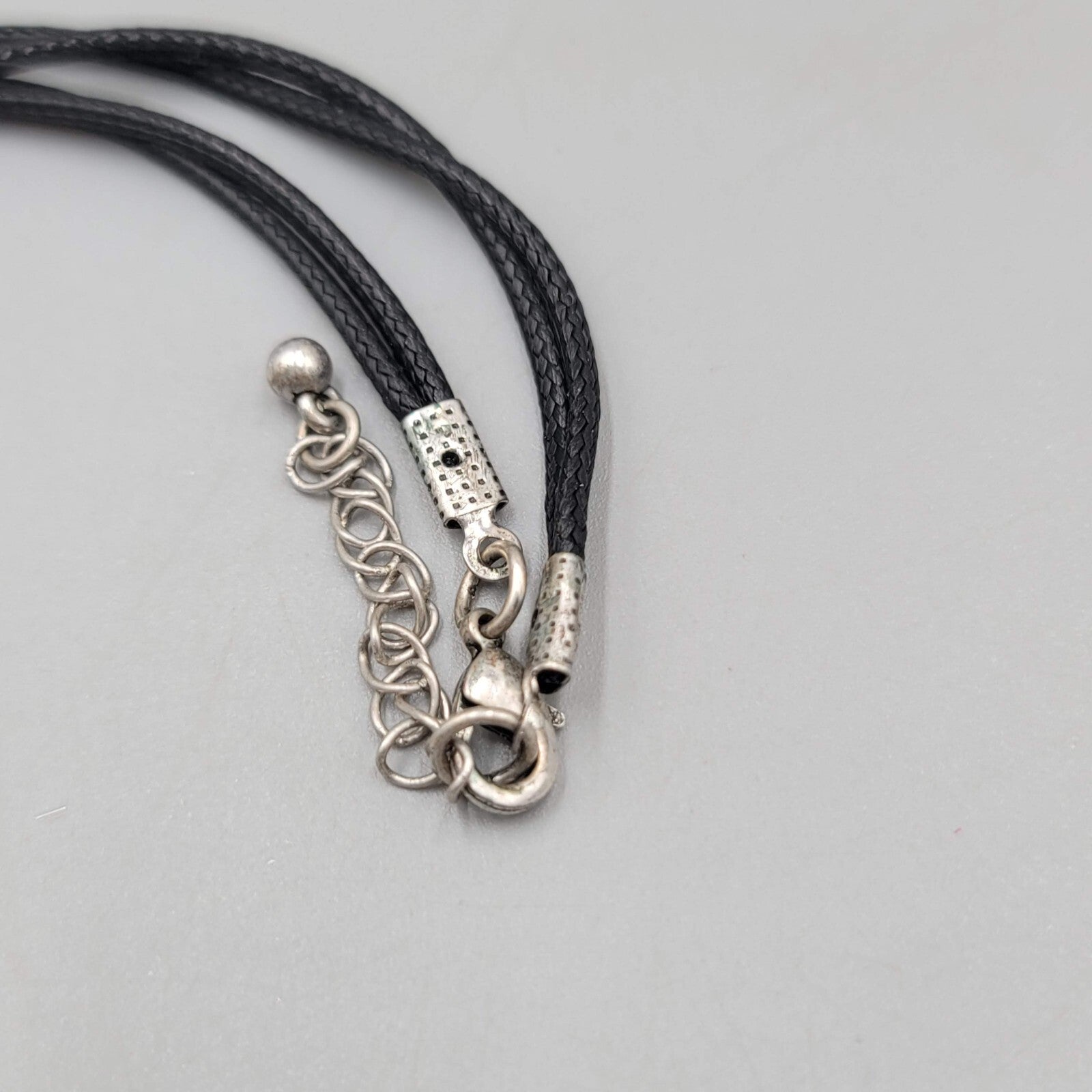 Multiple Open Rings Necklace Embossed Silver tone Black Cord 18"