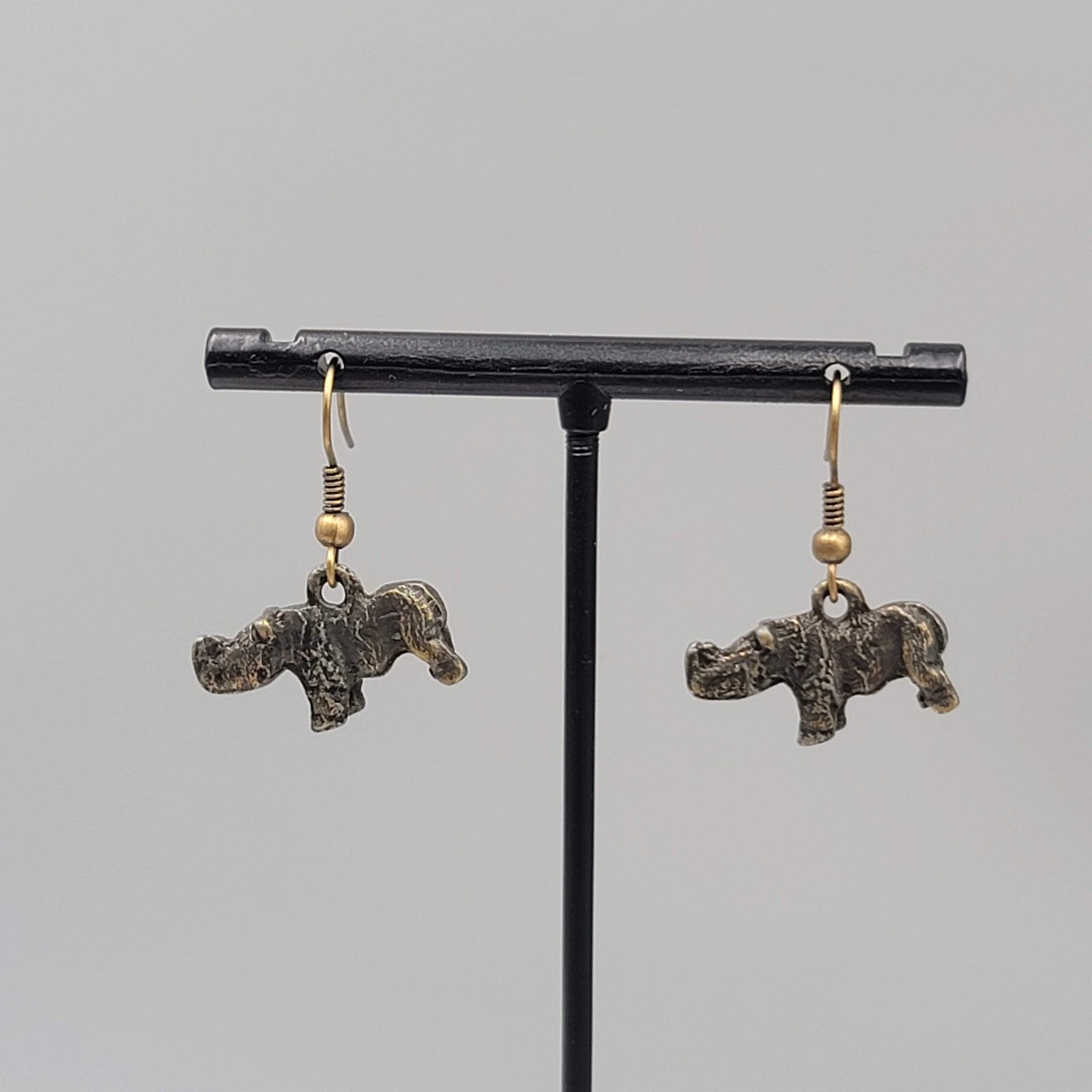 Rhinoceros Pierced Earrings Bronze tone Dangle 1/2"