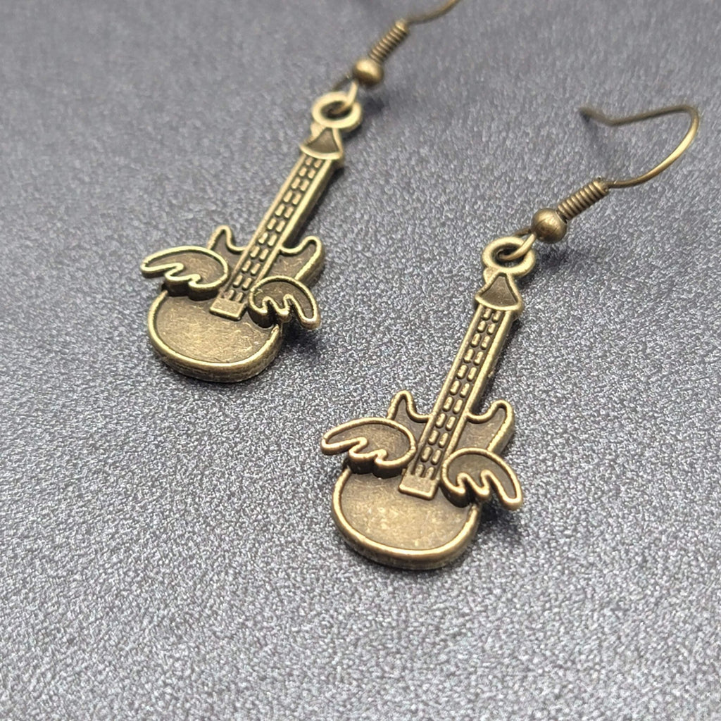 Pierced Earrings Bronze tone Embossed Winged Guitar Dangle 1.25"