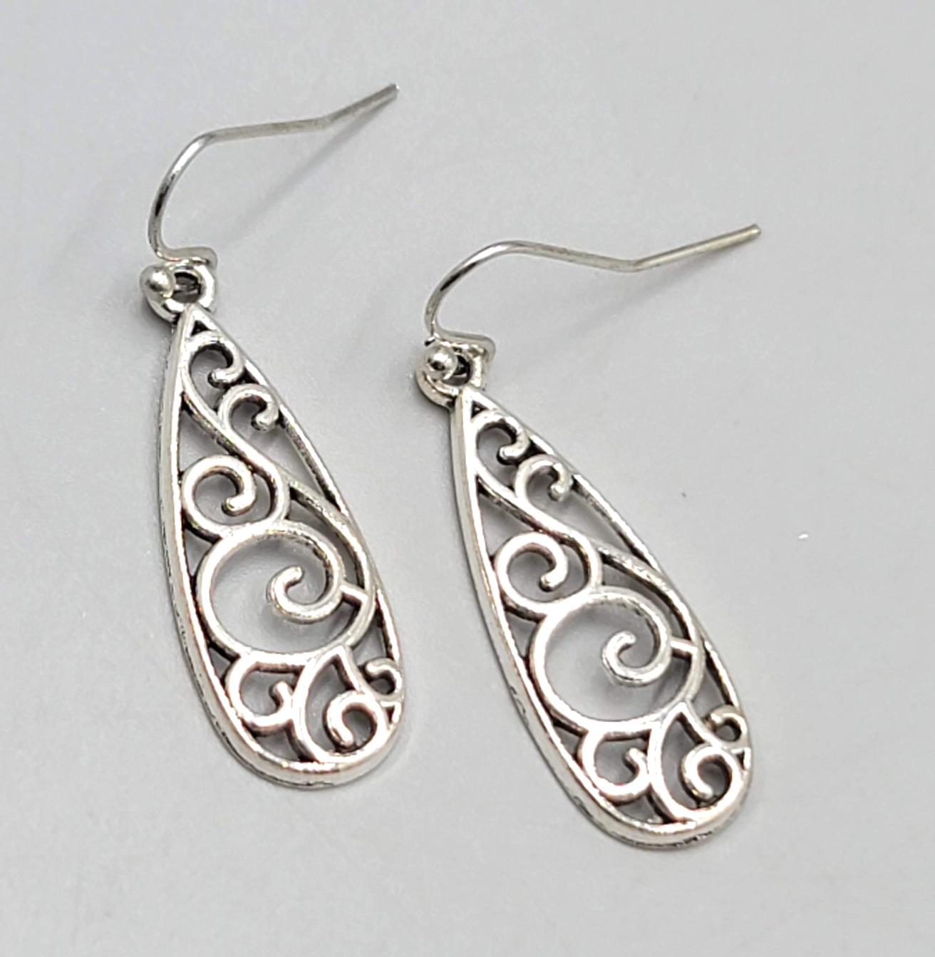 Open Filigree Long Teardrop Pierced Earrings Silver tone Dangle   1.25"
