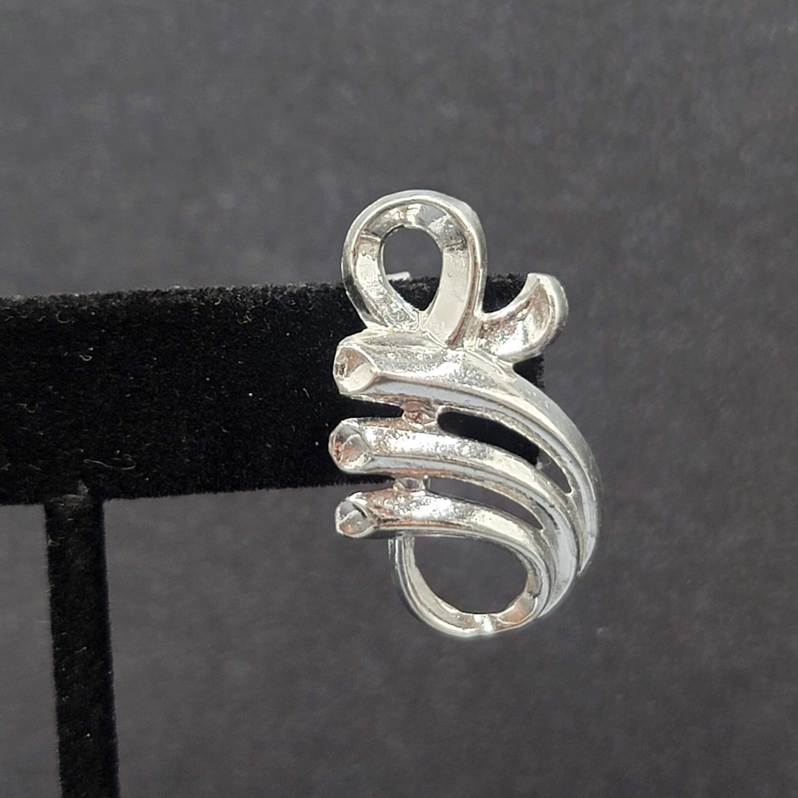 Vintage Clip on Earrings Pat Pend Silver tone Swirl Climber 1.25"