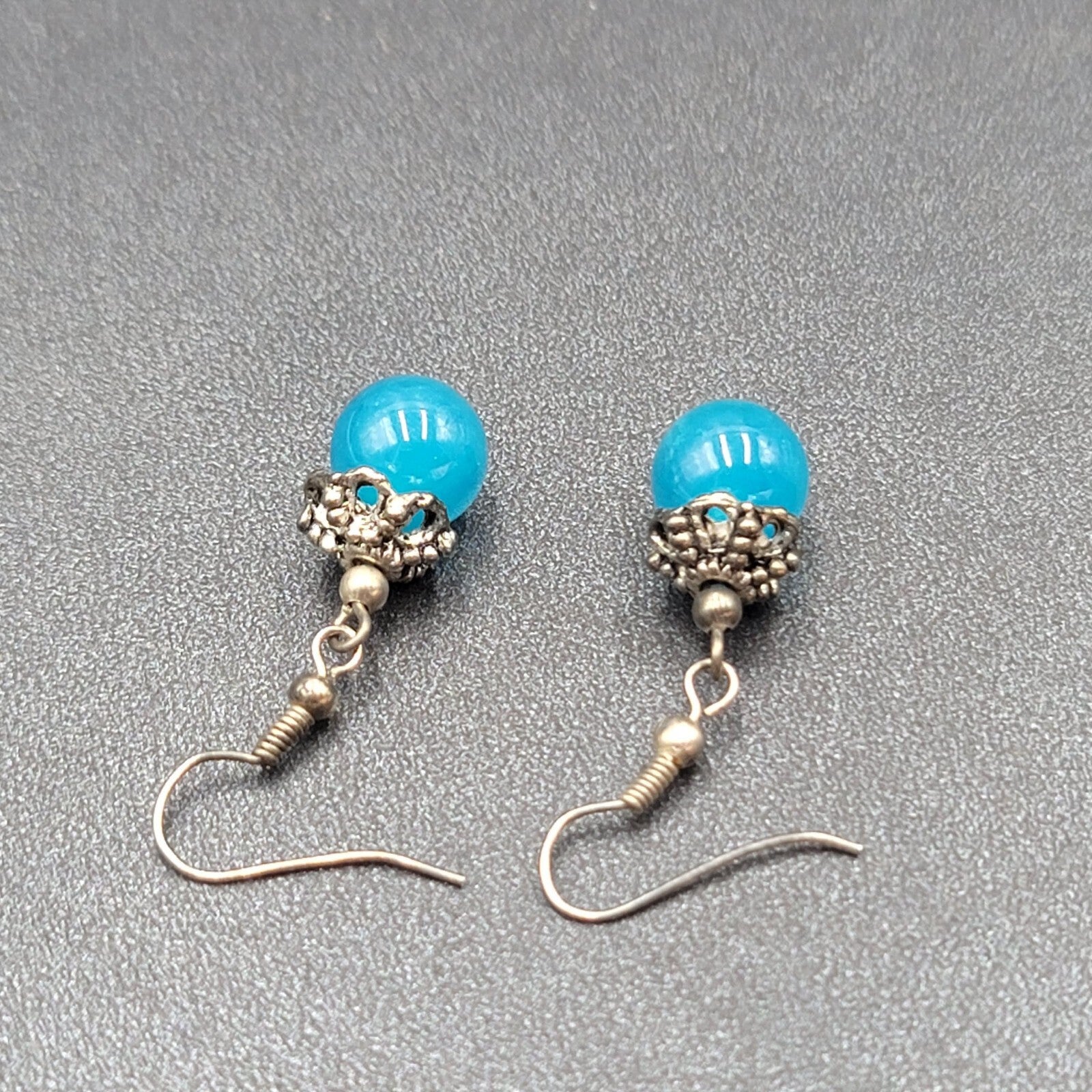 Pierced Earrings Silver tone Filigree Capped Blue Glass Bead Dangle 3/4"