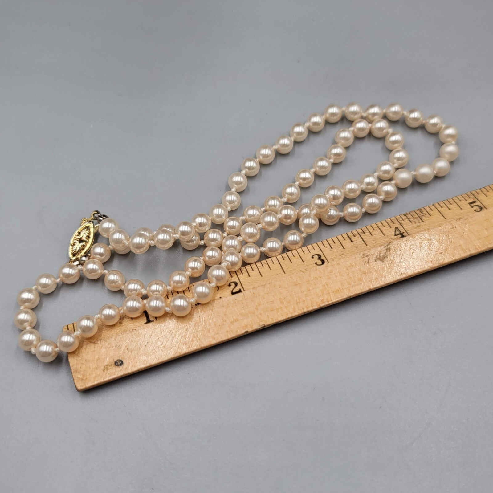 Vintage Faux Pearl Necklace Hand Knotted Gold tone Clasp 24"