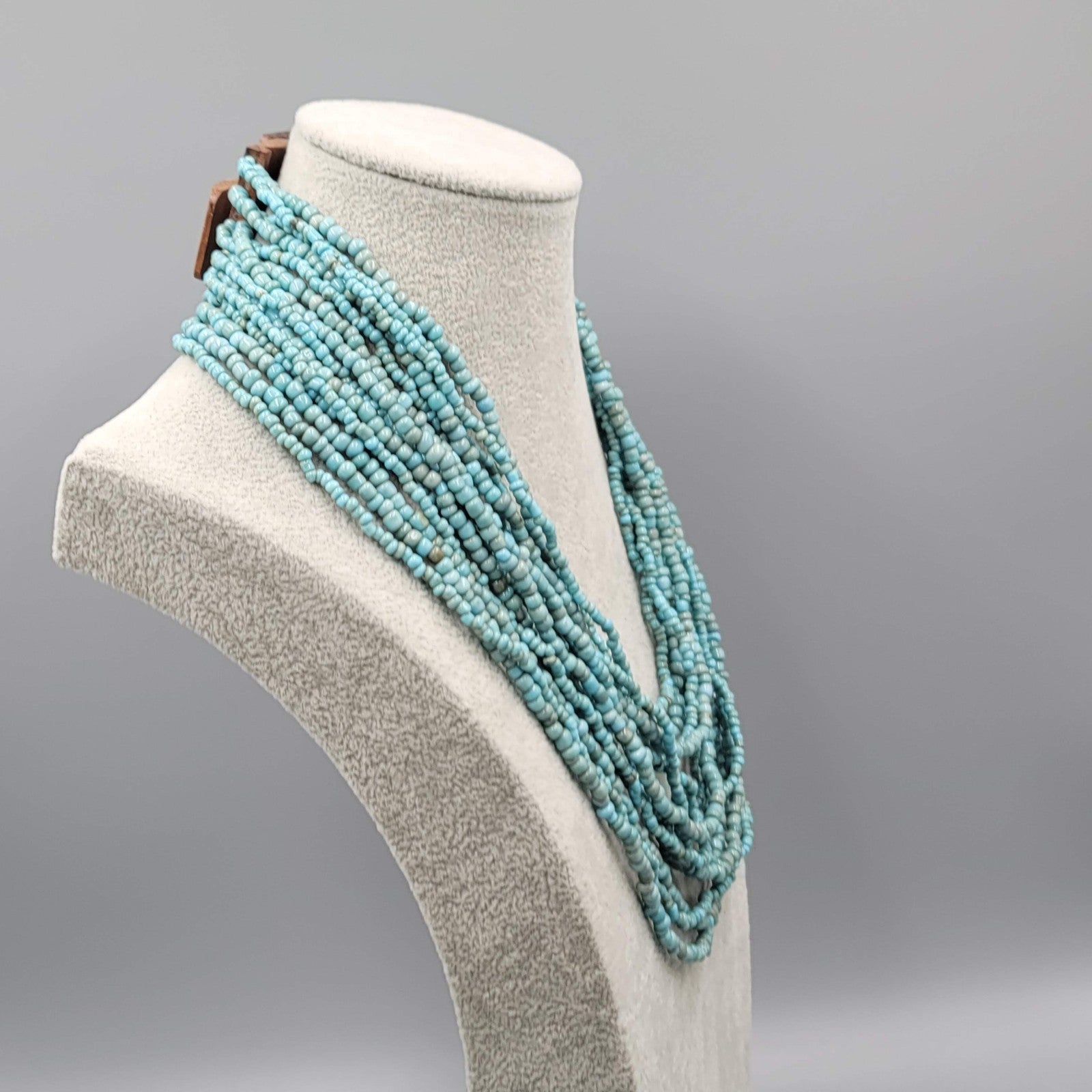 Artisan Necklace 14 Strand Blue Seed Bead Wood Clasp Statement 18"