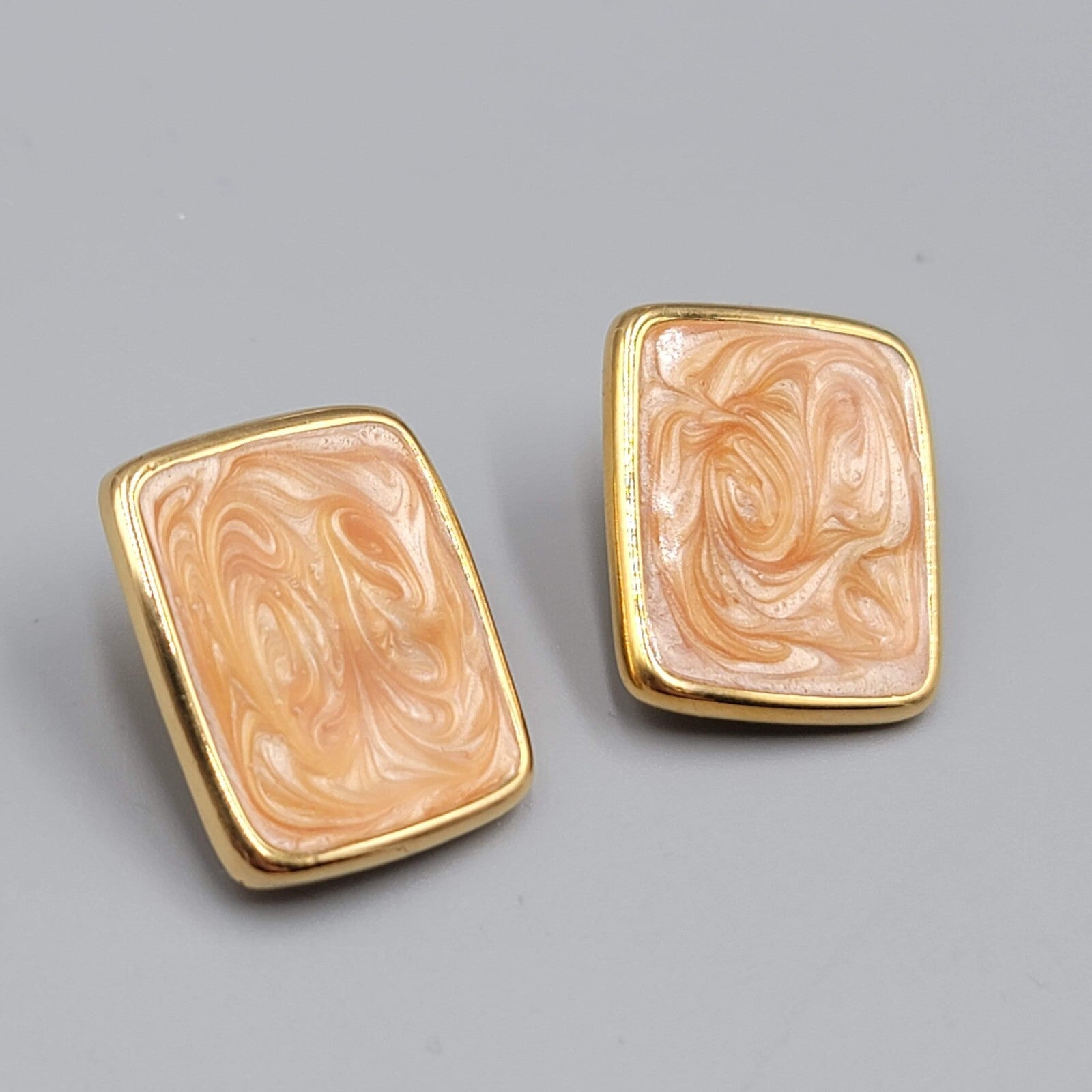 Vintage Monet Clip on Earrings Gold plated Rectangle Peach Swirl Enamel Drop 1"
