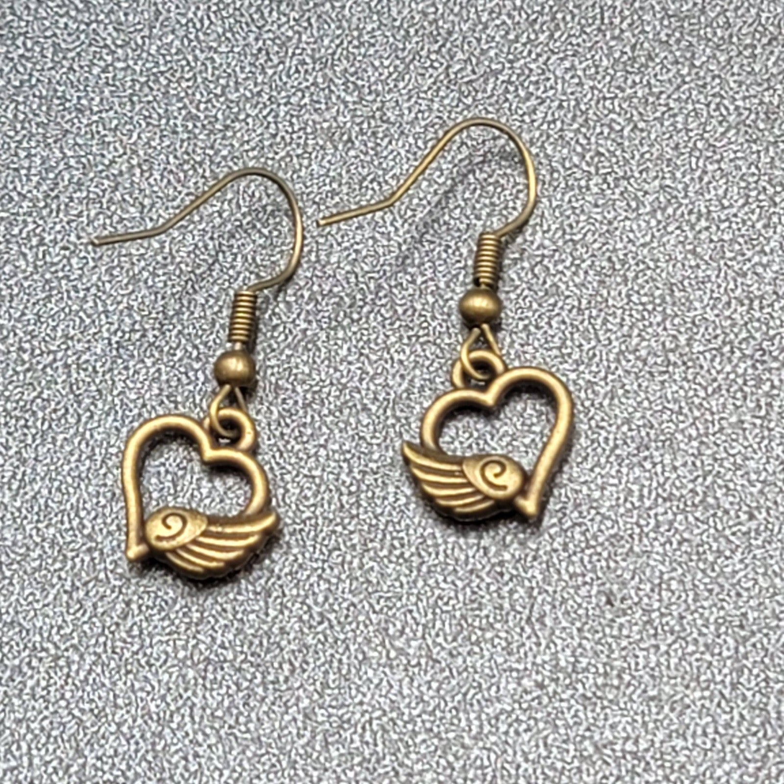 Pierced Earrings Bronze tone Open Winged Heart Dainty Dangle 1/2"
