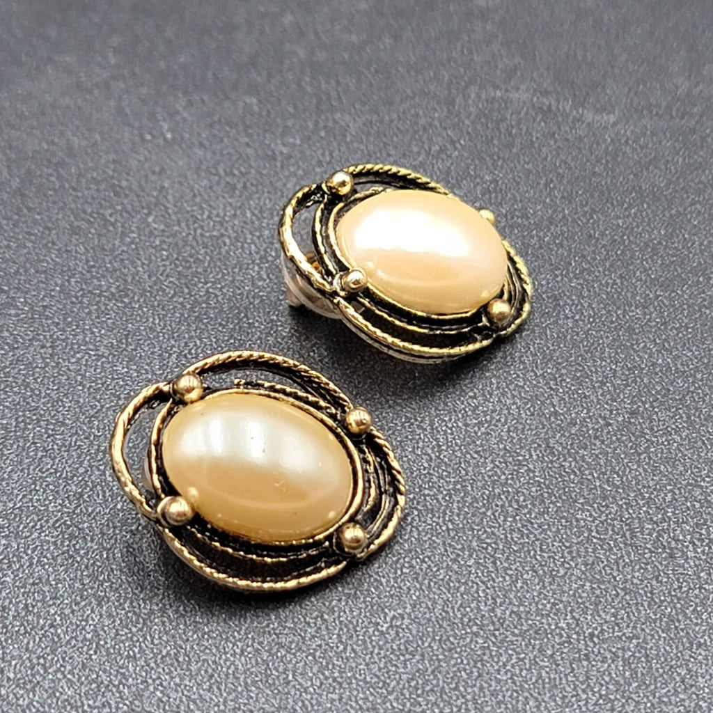 Vintage Pierced Earrings Gold tone White Cabochon Oval Drop 1"
