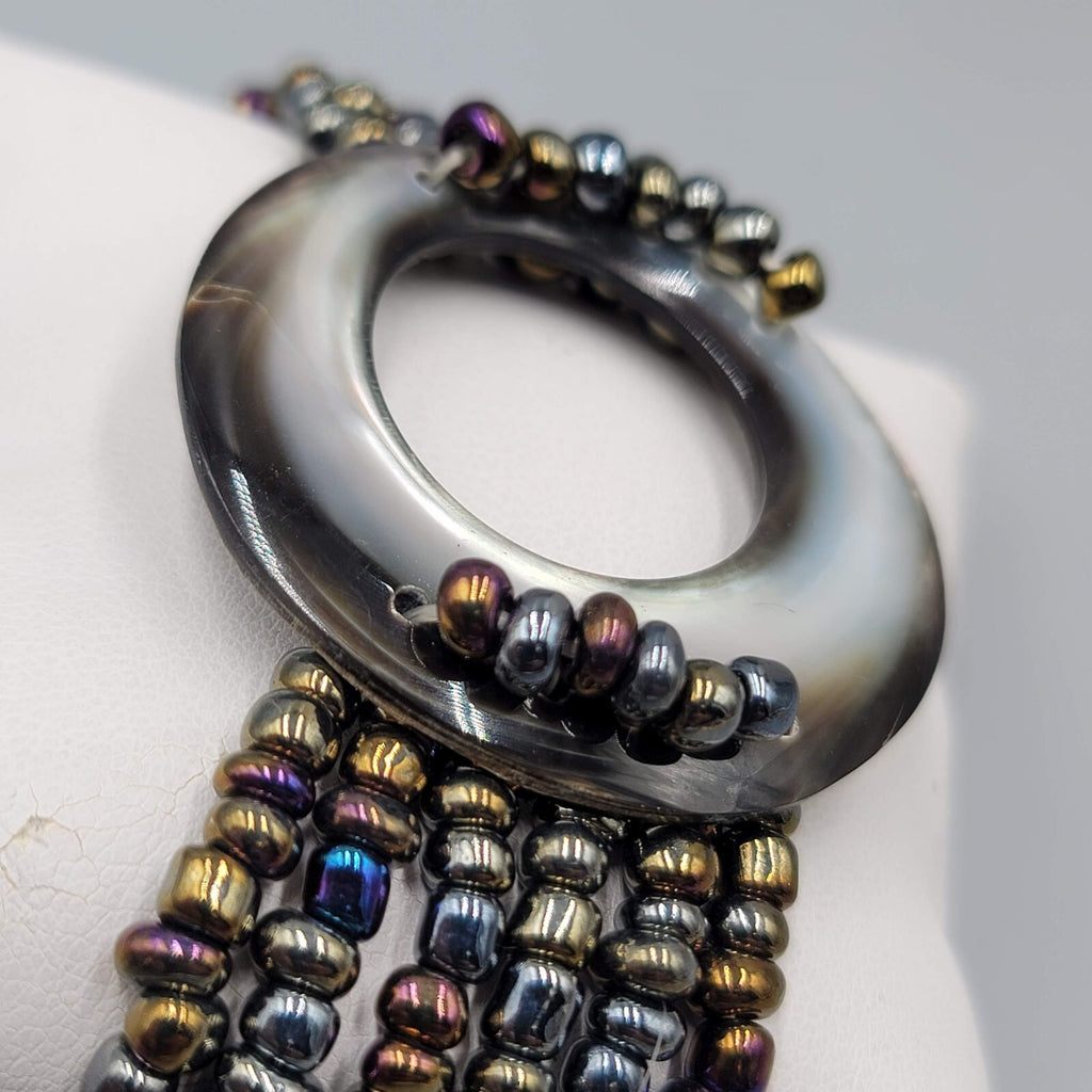 Multi Strand Glass Seed Bead Bracelet with Abalone Shell Ring Accent 6.75 in