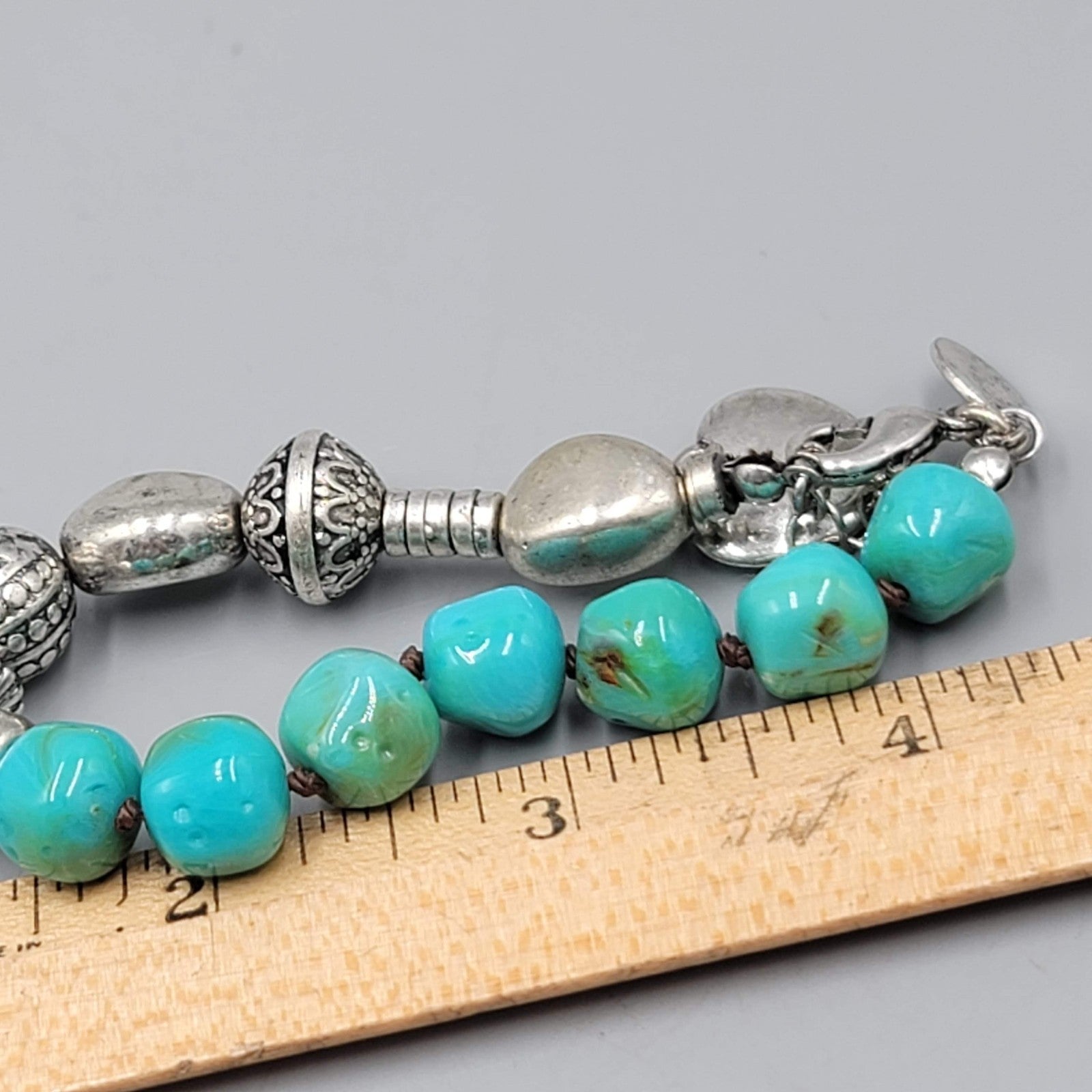 Louisa Bracelet Blue Pottery Bead Silver tone Feather Charm 6.75"-7.75"