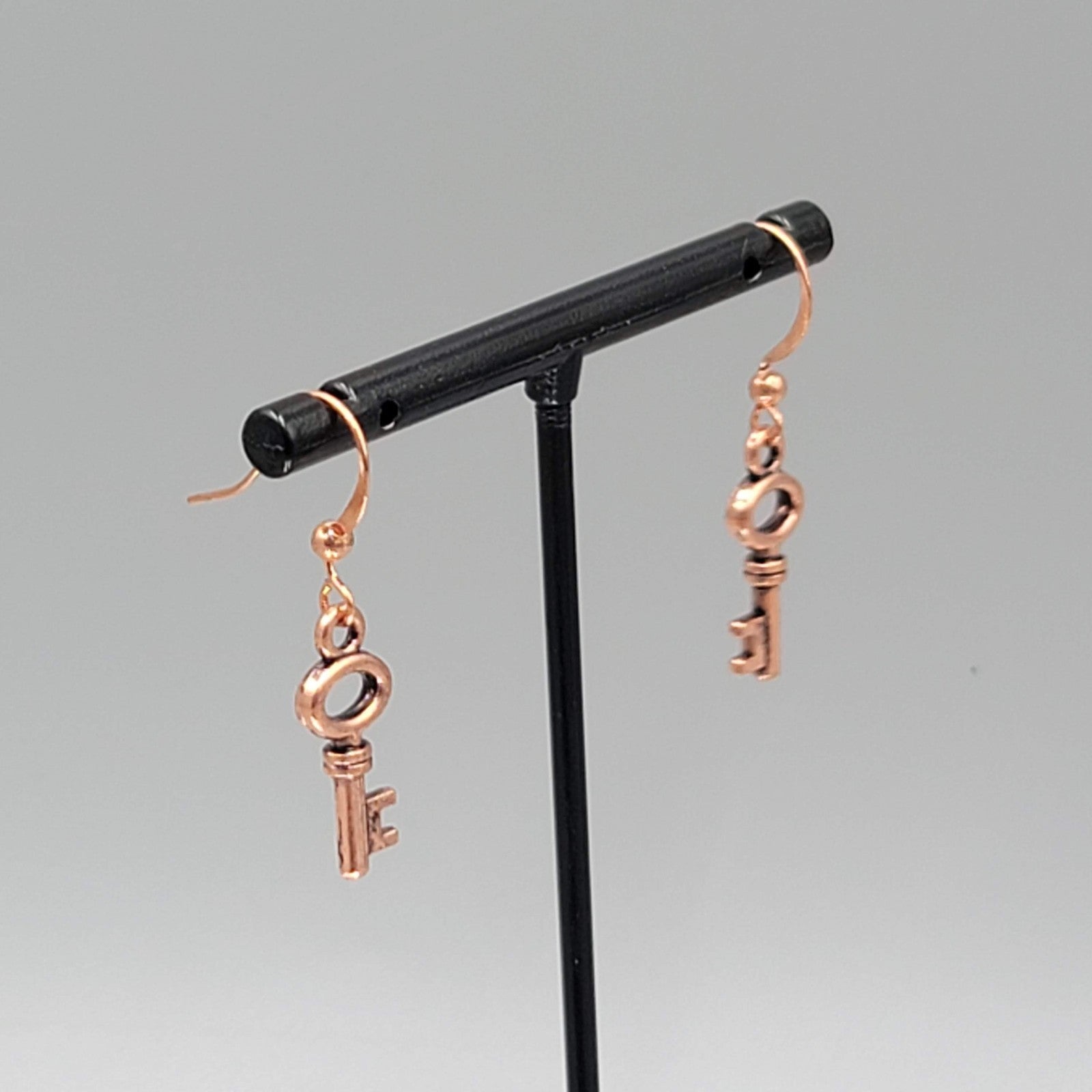 Copper tone Skeleton Key Pierced Earrings Dangle Small 3/4"