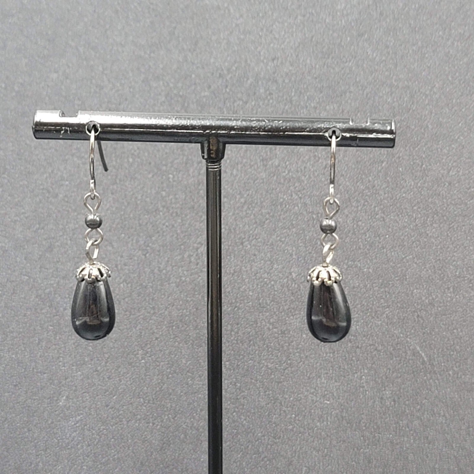 Pierced Earrings Black Metal Capped Teardrop Bead 3/4"