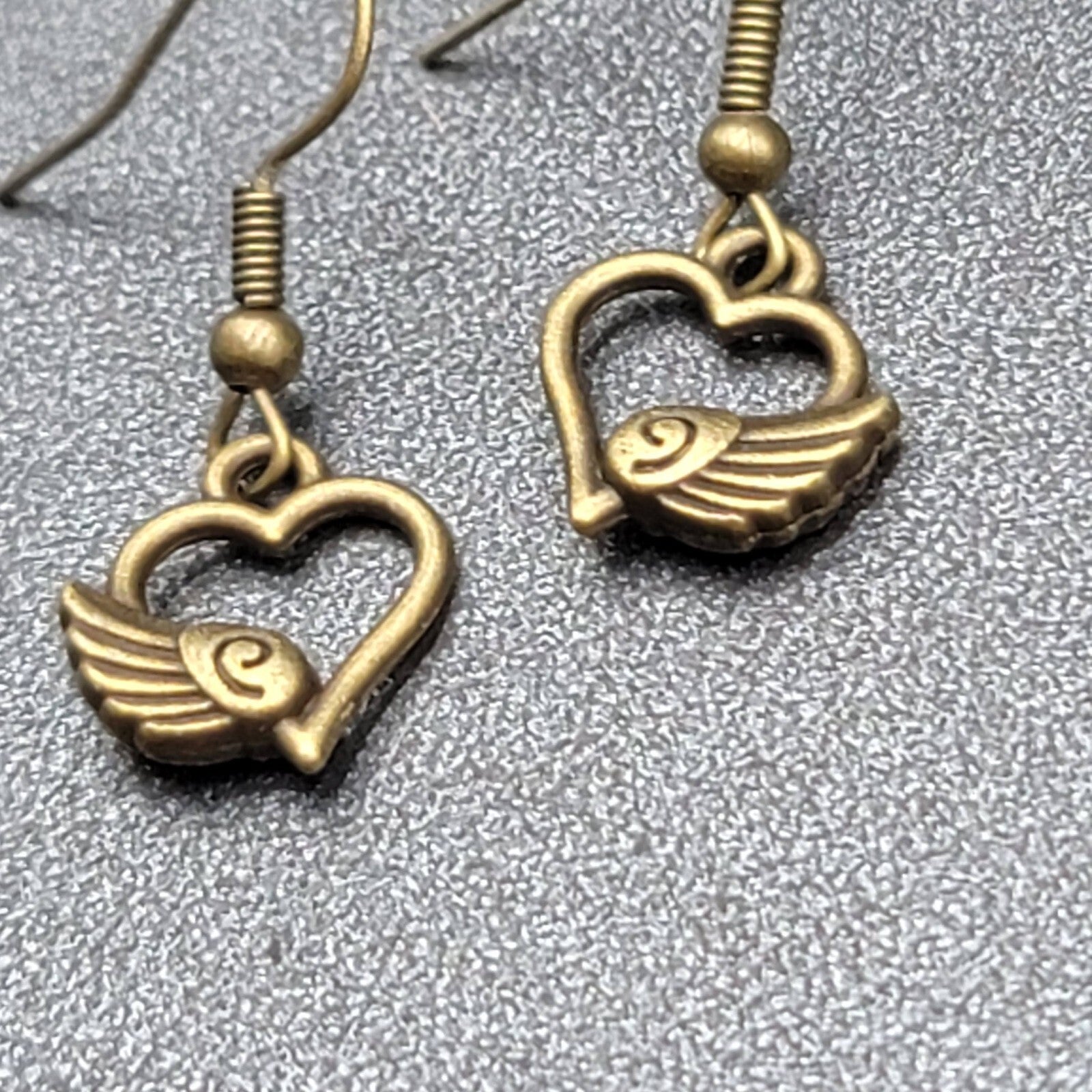 Pierced Earrings Bronze tone Open Winged Heart Dainty Dangle 1/2"