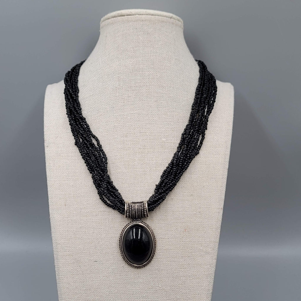 Multi Strand Black Seed Bead Necklace Oval Pendant Silver tone 18"
