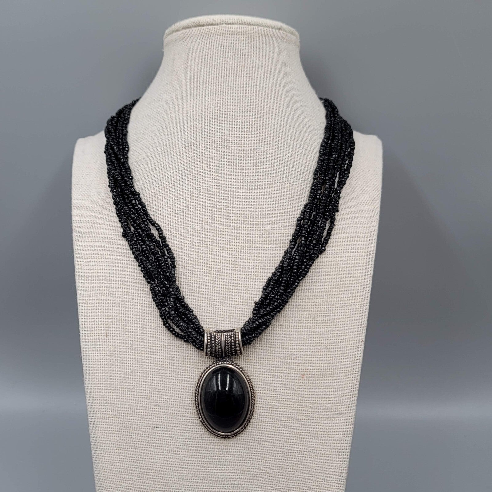 Multi Strand Black Seed Bead Necklace Oval Pendant Silver tone 18"