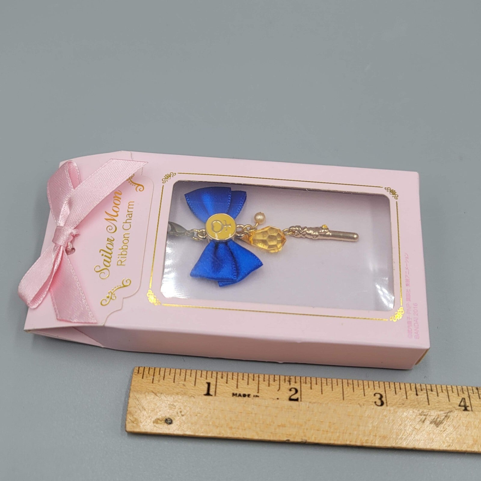 Sailor Moon Blue Ribbon Charm Gold tone
