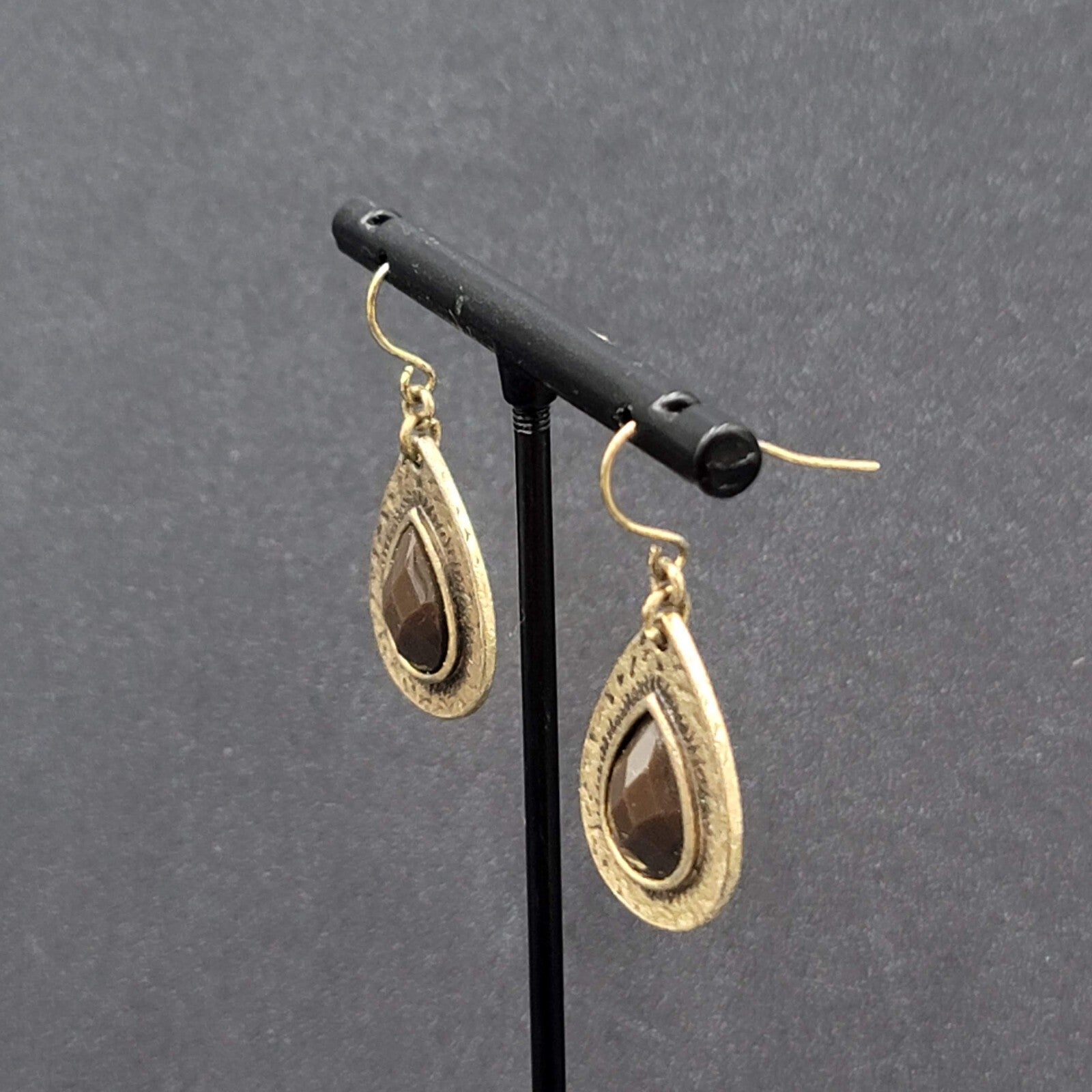 Pierced Earrings Antiqued Gold tone Teardrop Faceted Red Accent 1"