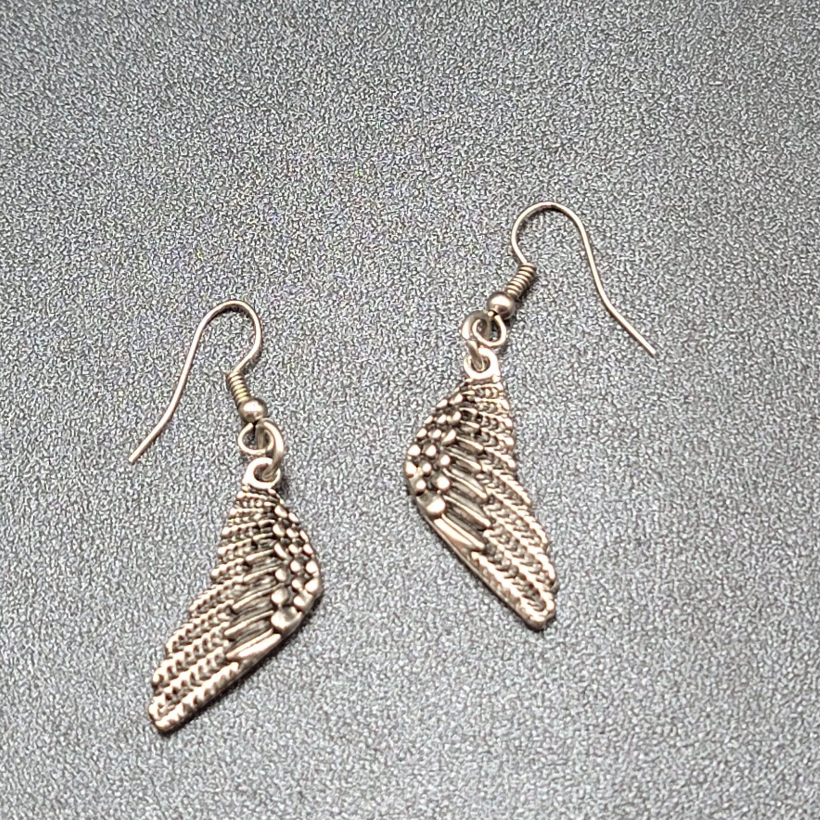 Pierced Earrings Silver tone Detailed Wings Dangle 1 1/8"