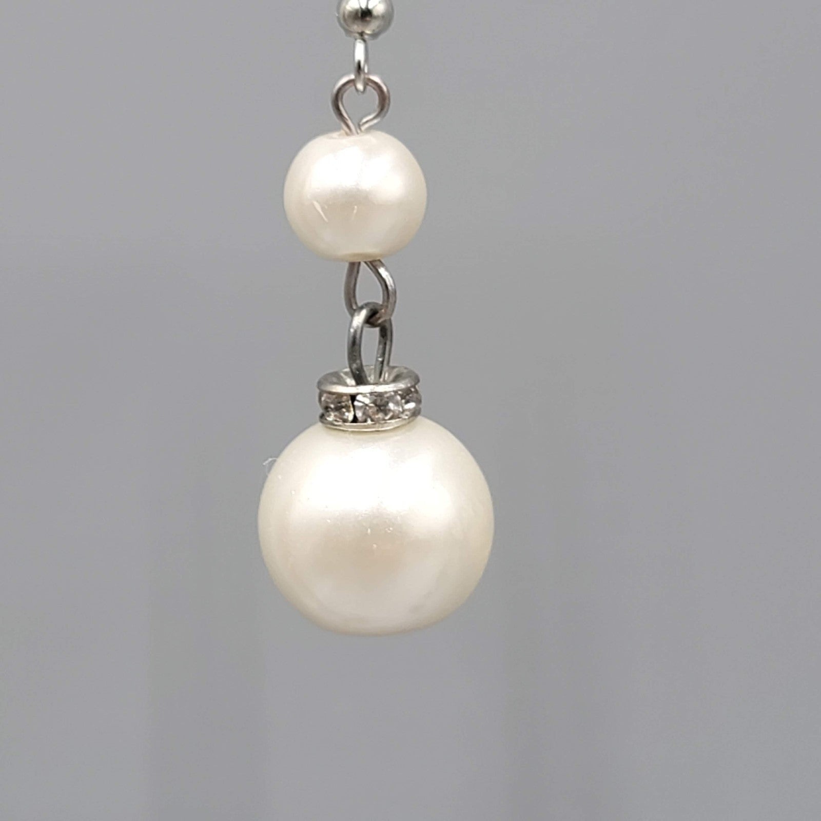 Satin Look White Bead Pierced Earrings Silver tone Dangle 1.25 in