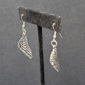 Pierced Earrings Silver tone Detailed Wings Dangle 1 1/8"