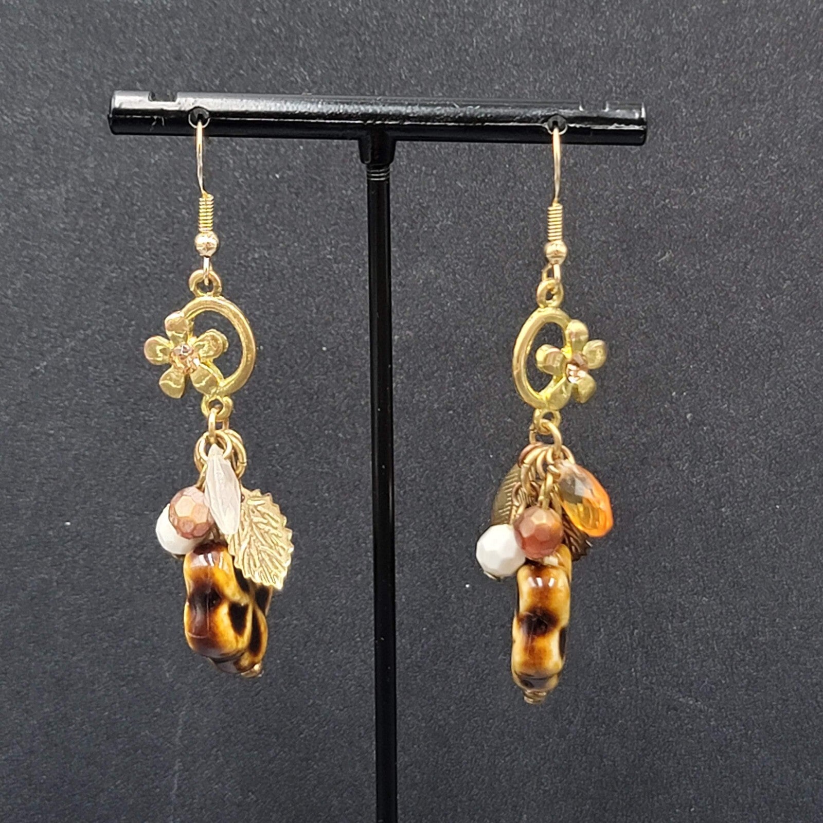 Pierced Earrings Gold tone Pottery Flower Bead Dangle Leaves 2"