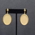 Vintage Clip on Earrings Gold tone Cream White Enamel Oval Dangle 1.5"