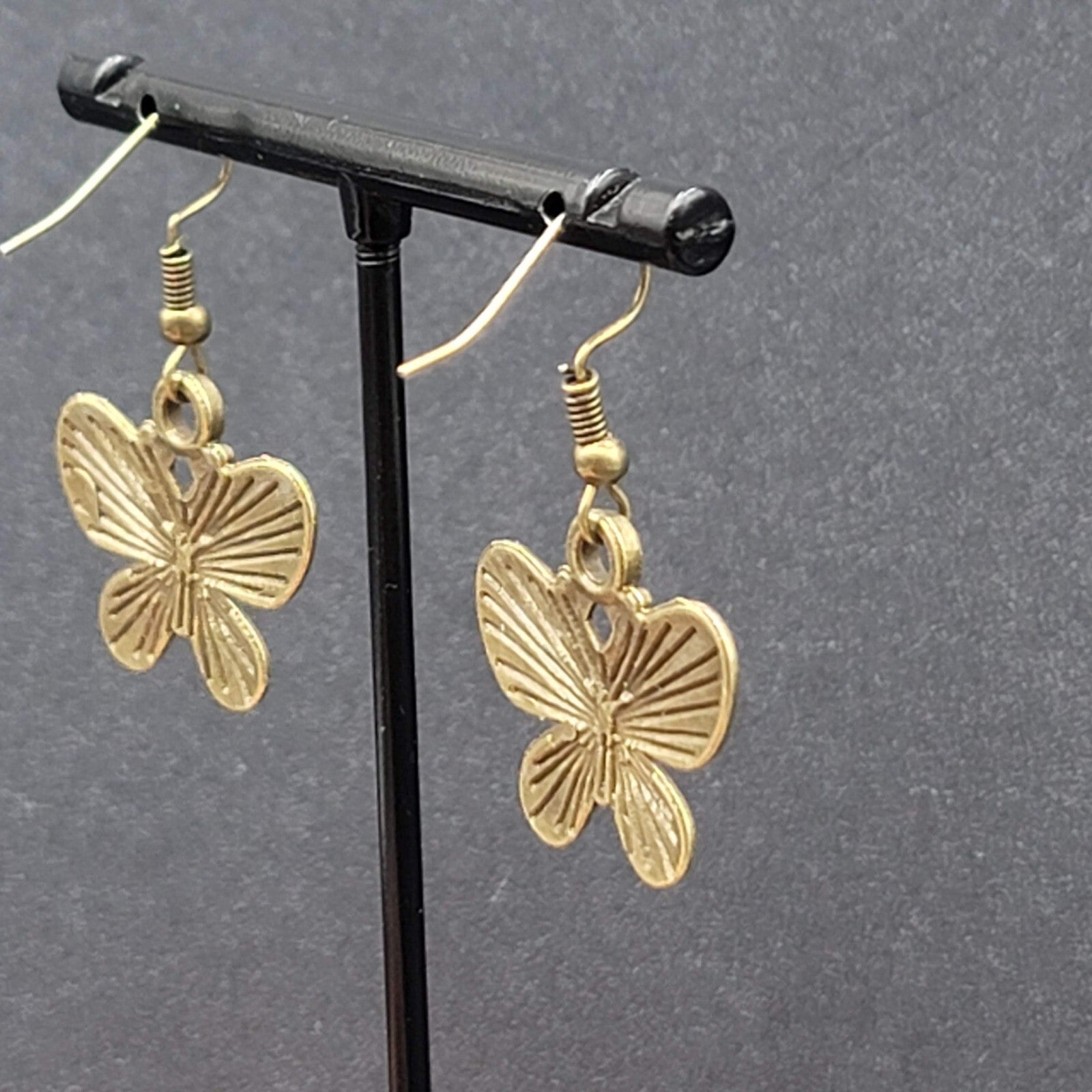 Butterfly Pierced Earrings Dangle Bronze tone Embossed 7/8"