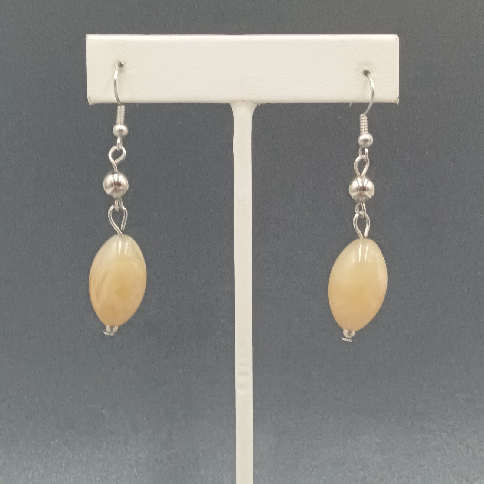 Pierced Earrings Silver tone Tan Swirl Acrylic Bead Dangle 1.5"