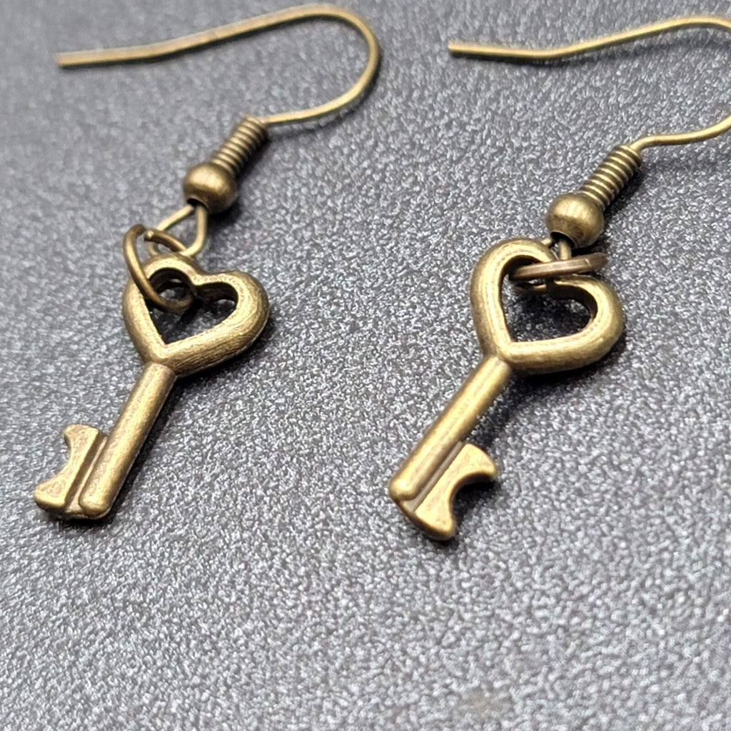 New Pierced Earrings Bronze tone Heart Skeleton Key Dangle 5/8"