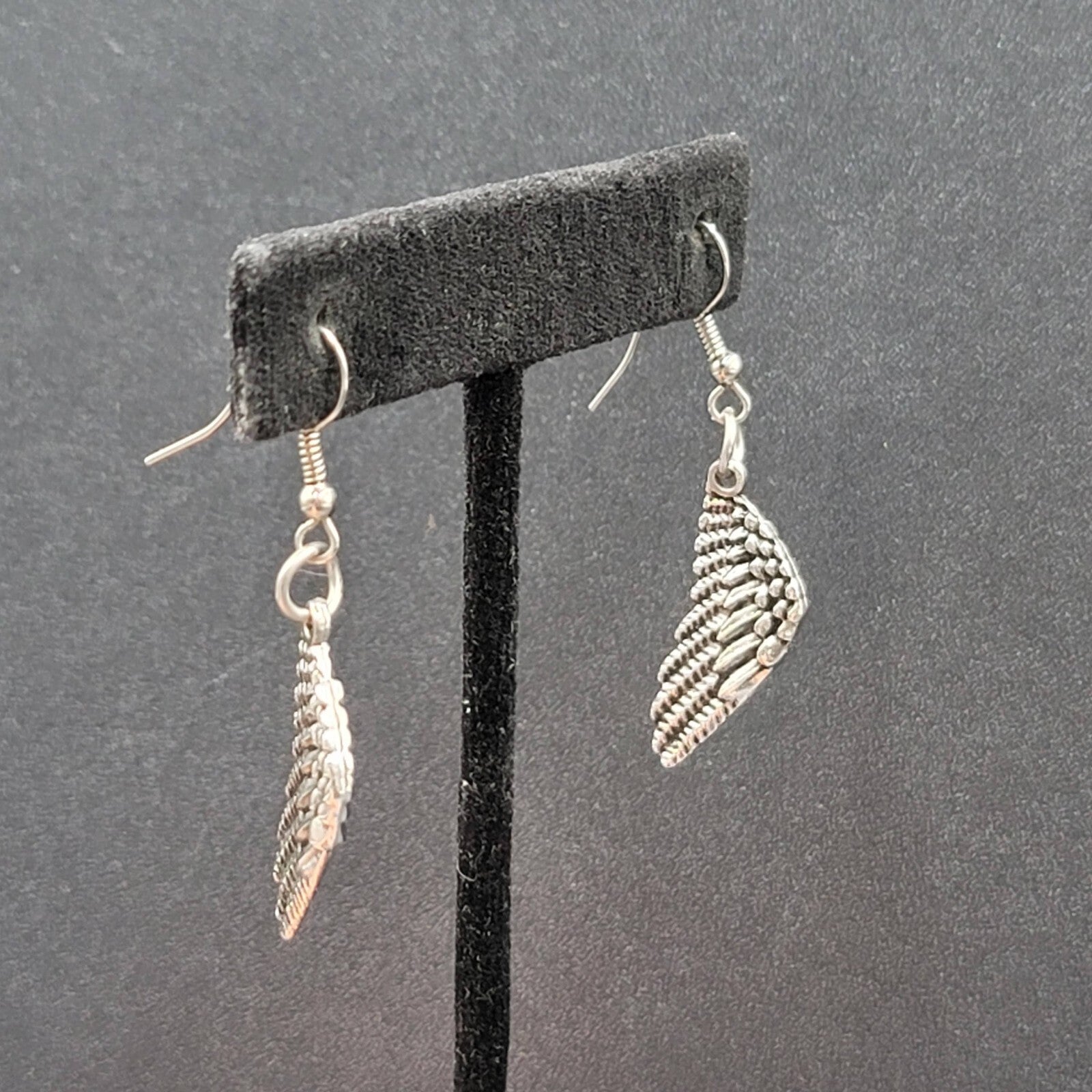 Pierced Earrings Silver tone Detailed Wings Dangle 1 1/8"