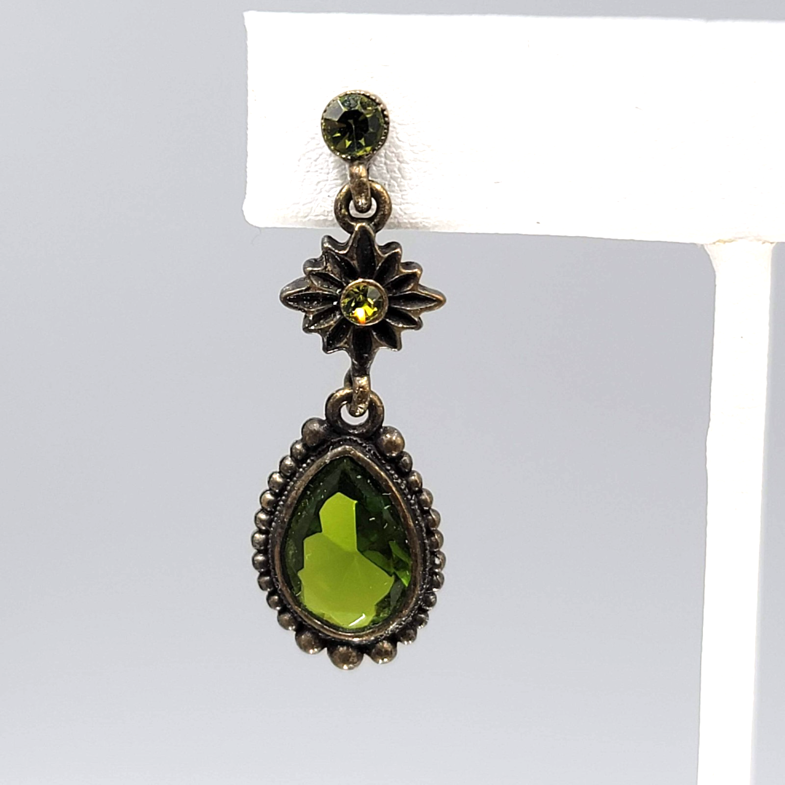 Green Rhinestone Teardrop Dangle Pierced Earrings Bronze tone 1.5 in