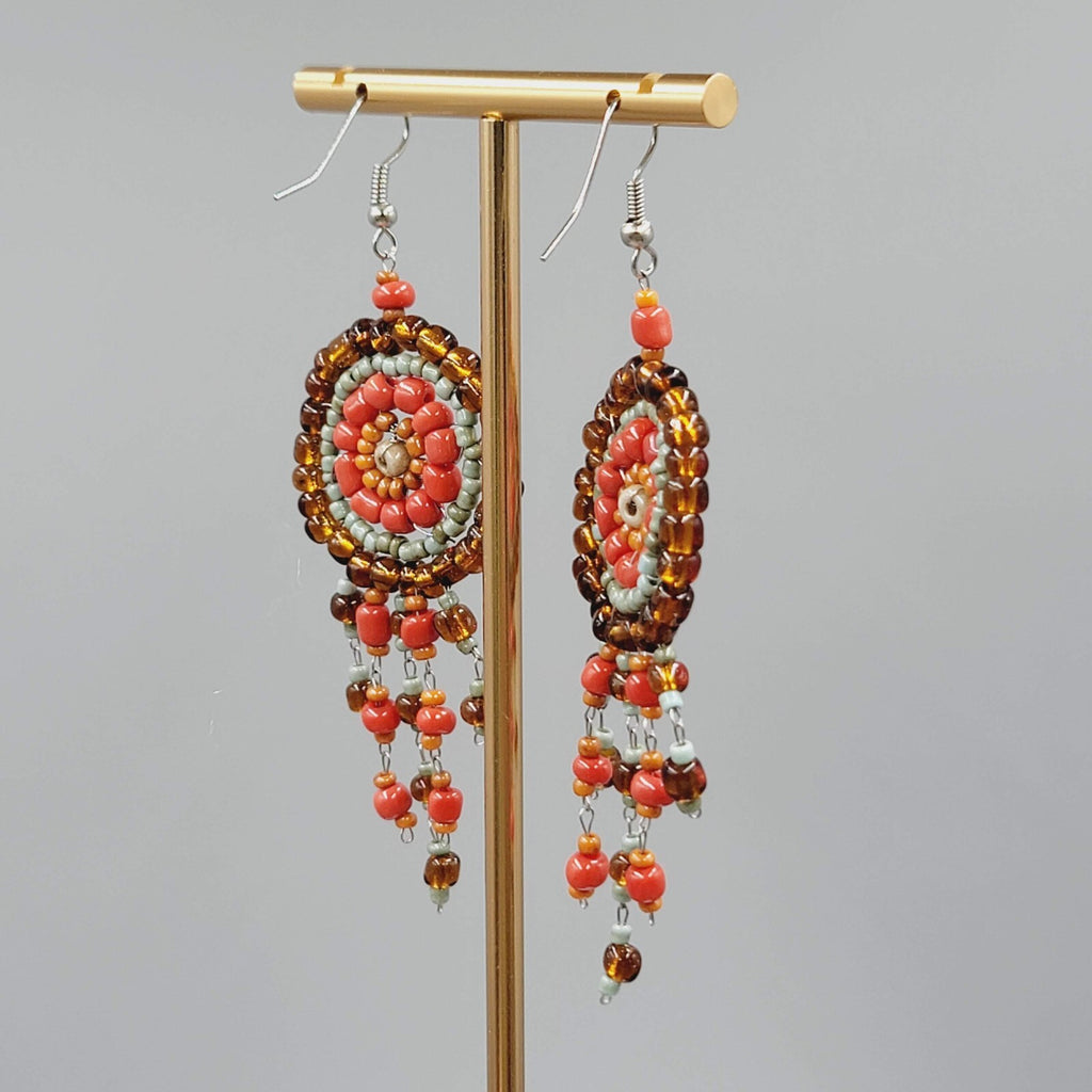 Medallion Bead Pierced Earrings Silver tone Dangle Orange Brown Blue 2.25"