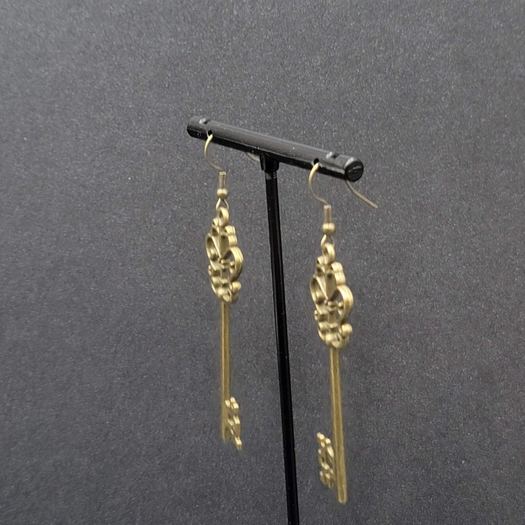 Pierced Earrings Bronze tone Long Antique Skeleton Key Dangle 2.25"