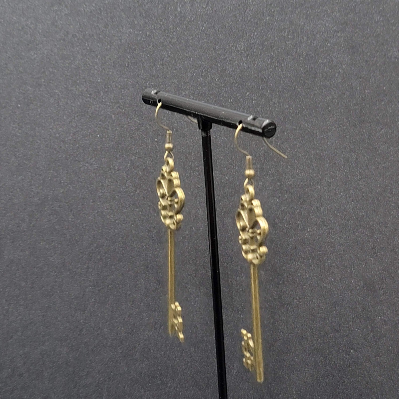 Pierced Earrings Bronze tone Long Antique Skeleton Key Dangle 2.25"