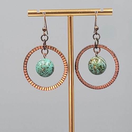 Bronze tone Dangle Pierced Earrings Green Bead Center Dangle 1.5"