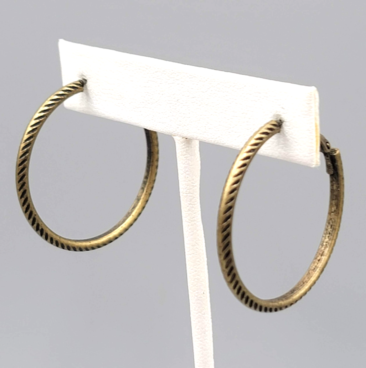 Embossed Thin Hoops Pierced Earrings Bronze tone 1.25 in
