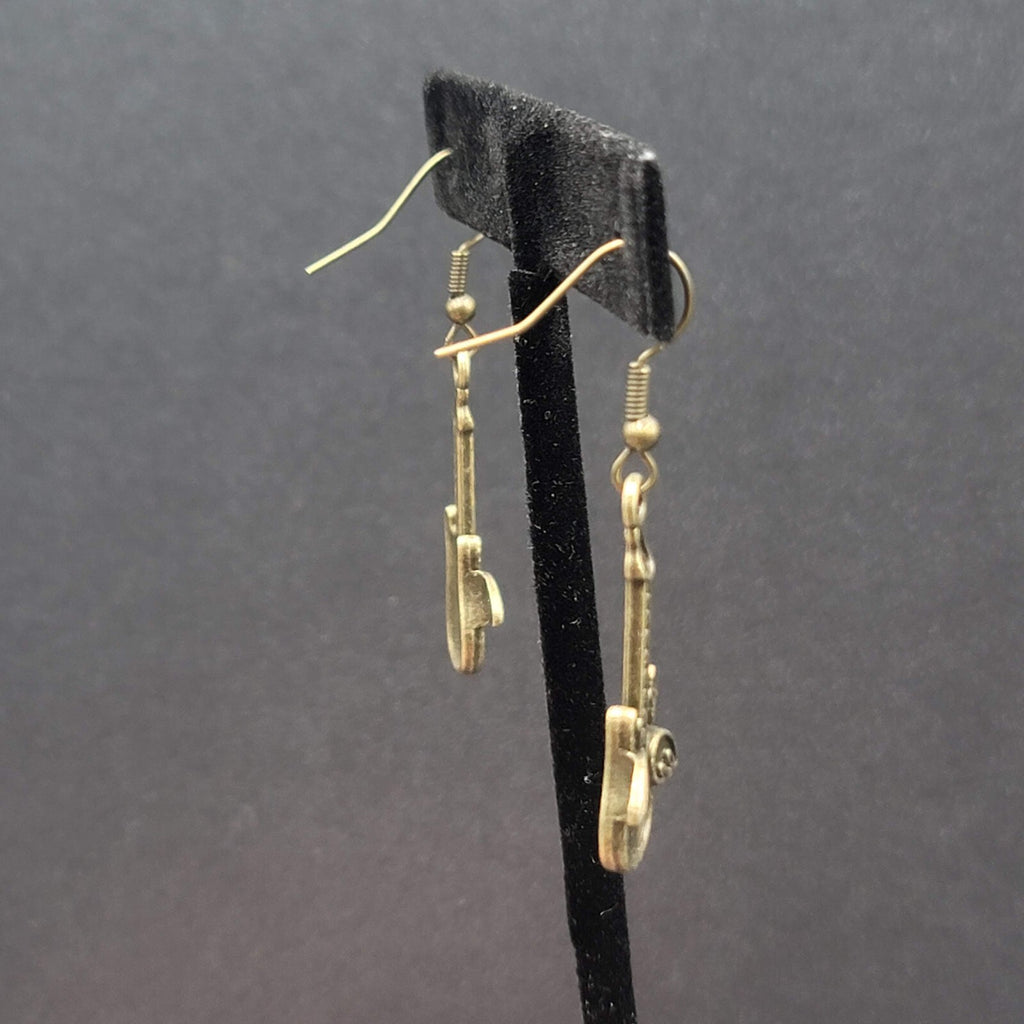 Pierced Earrings Bronze tone Embossed Winged Guitar Dangle 1.25"