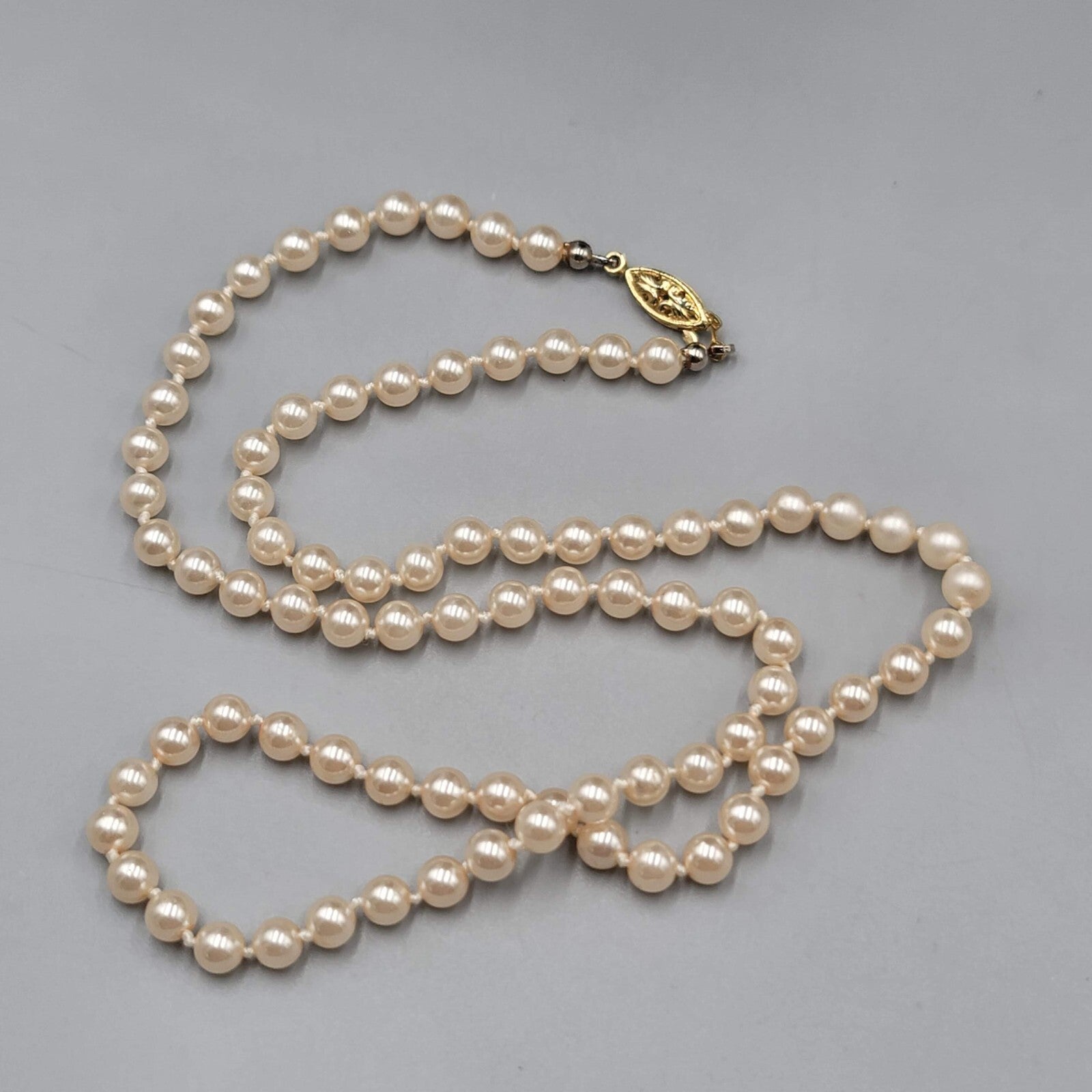 Vintage Faux Pearl Necklace Hand Knotted Gold tone Clasp 24"