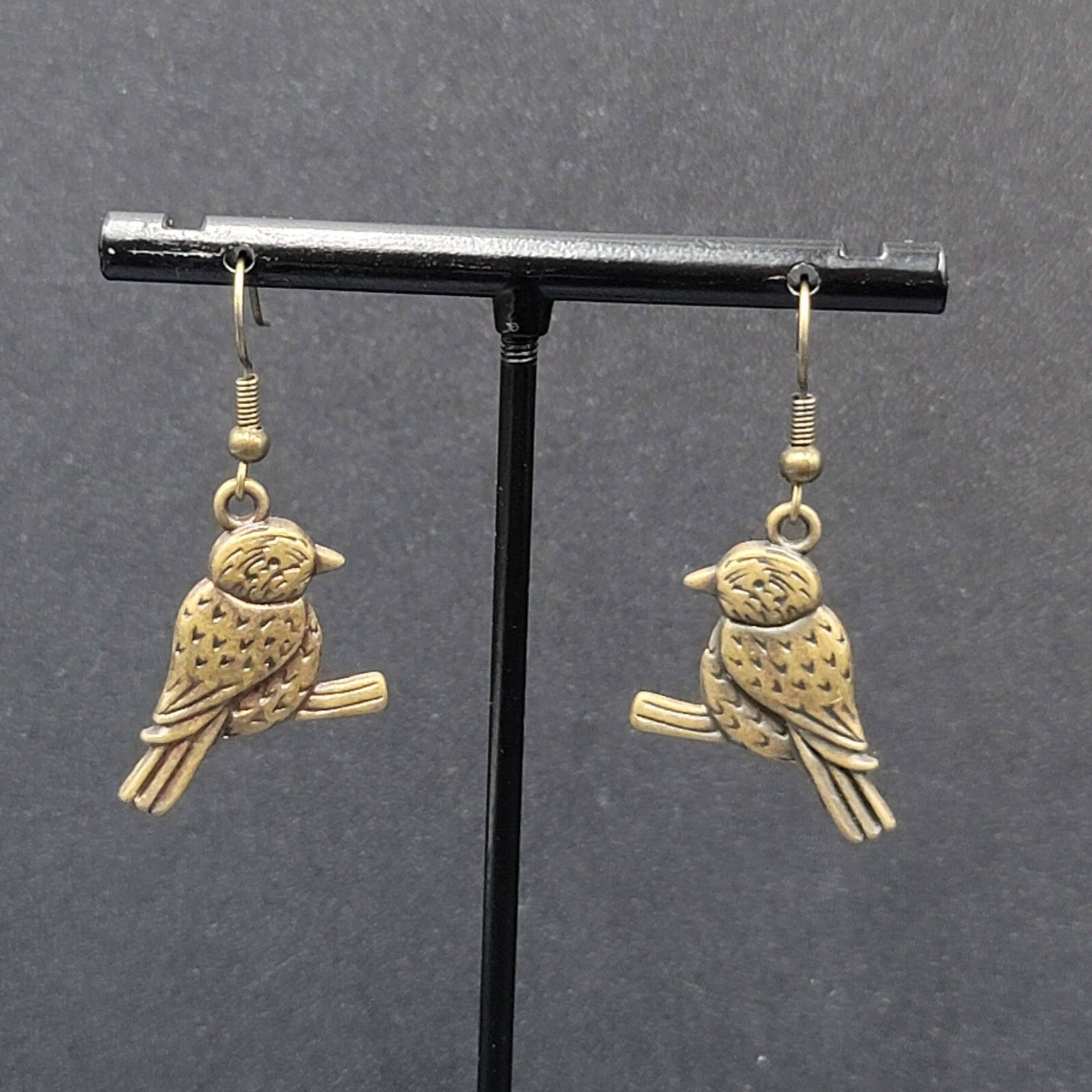 Bird on Perch Pierced Earrings Bronze tone Embossed Dangle 1"