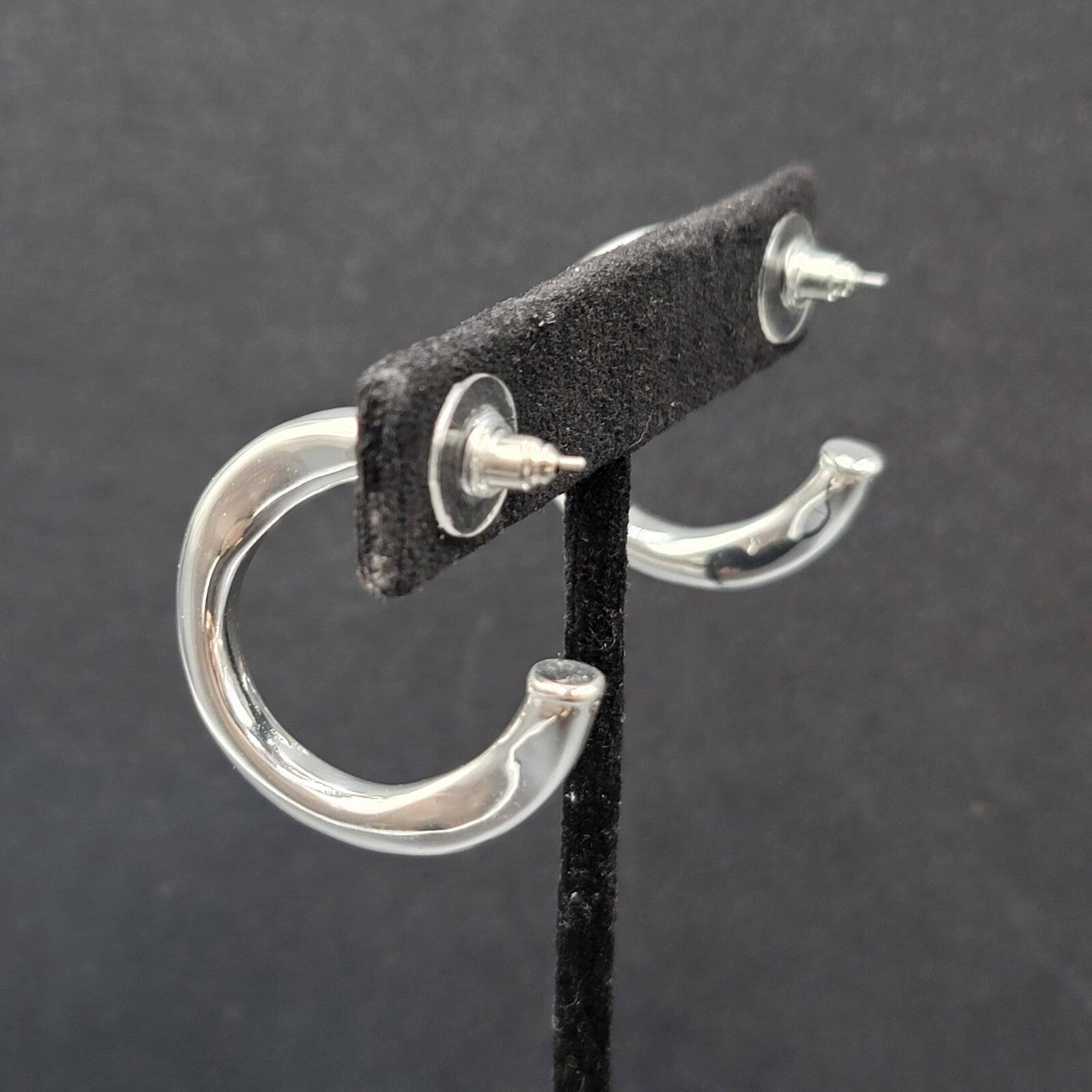 Pierced Earrings Polished Silver Plated Wavy Hoops Diamond Accent 1 1/8"