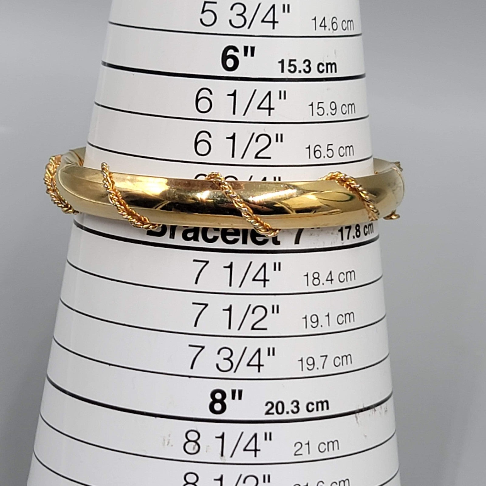 Vintage Hinged Oval Bracelet Gold tone Twist Accent Design 6.75 in