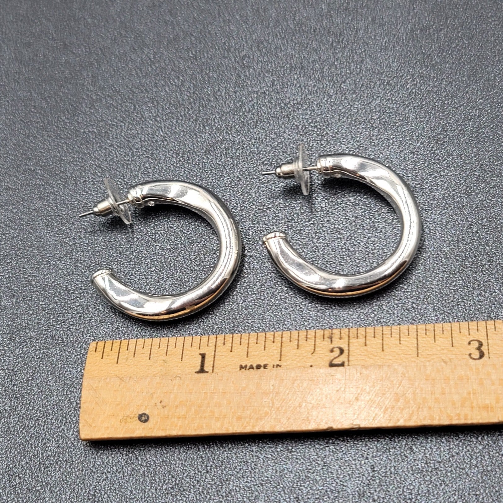 Pierced Earrings Polished Silver Plated Wavy Hoops Diamond Accent 1 1/8"