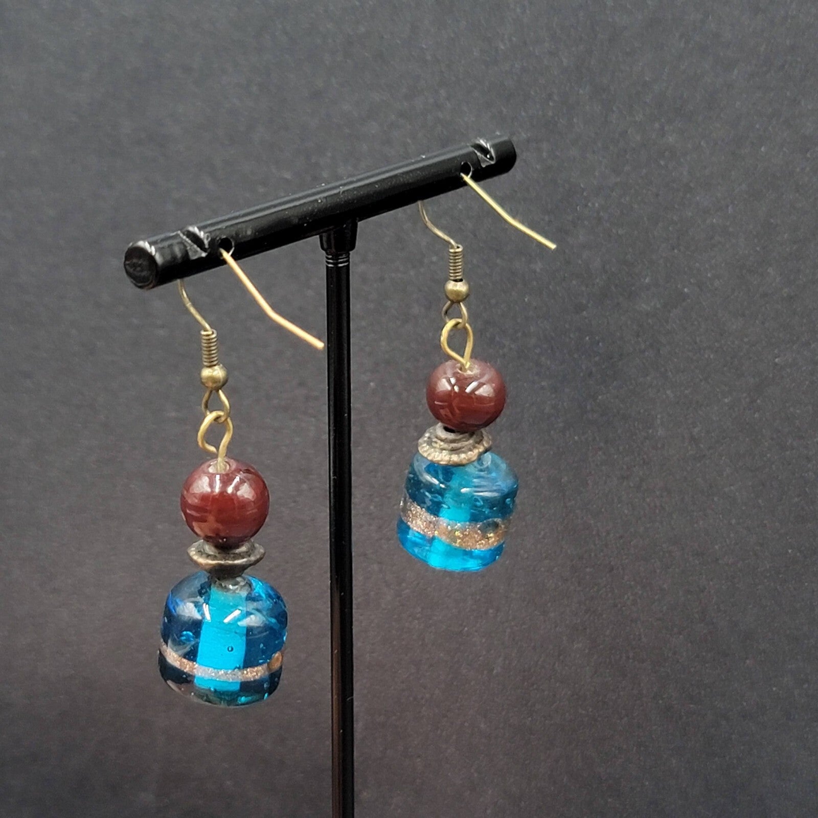 Pierced Earrings Bronze tone Art Glass Blue Bead Dangle 1.25"