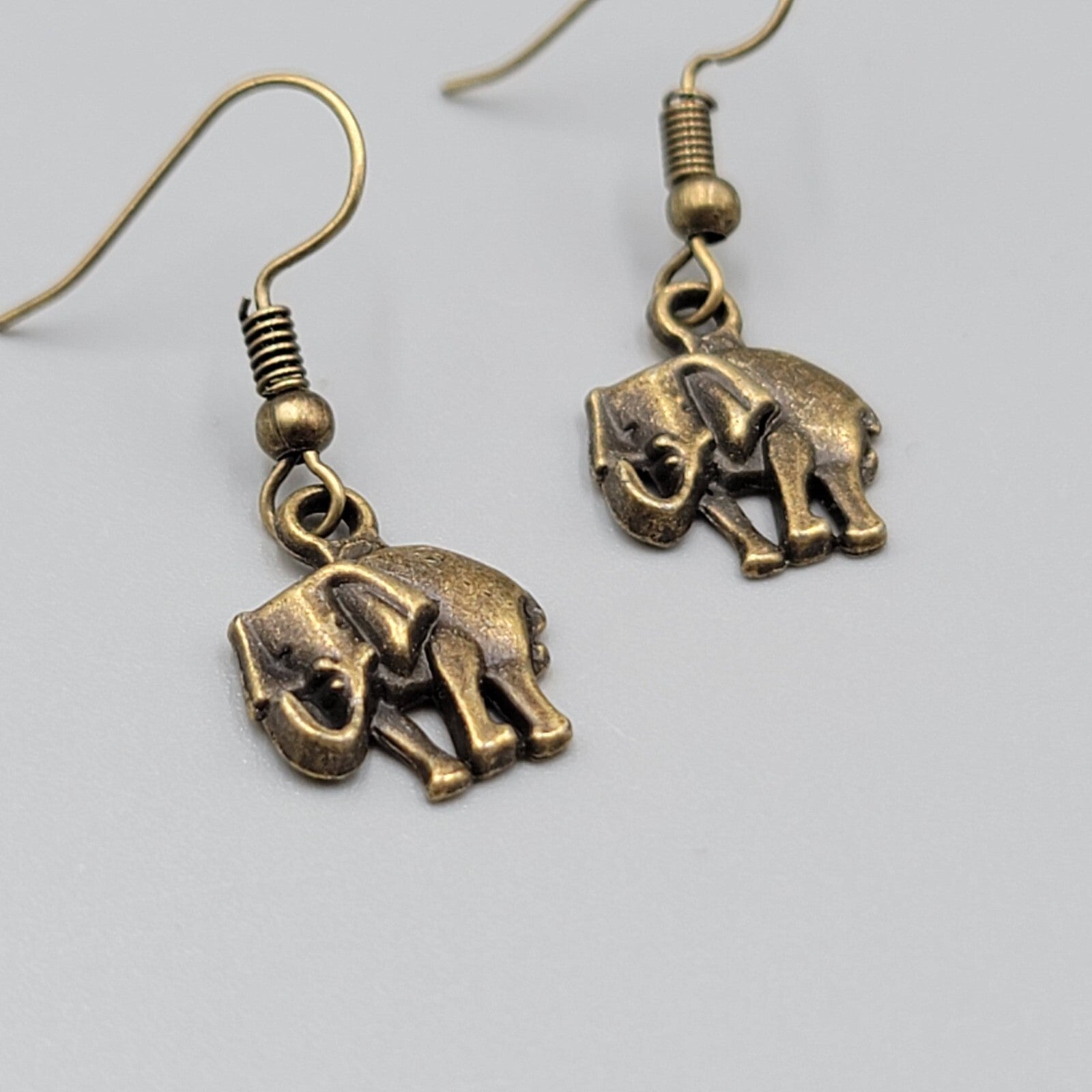 Elephant Pierced Earrings Bronze tone Embossed Dangle 5/8"