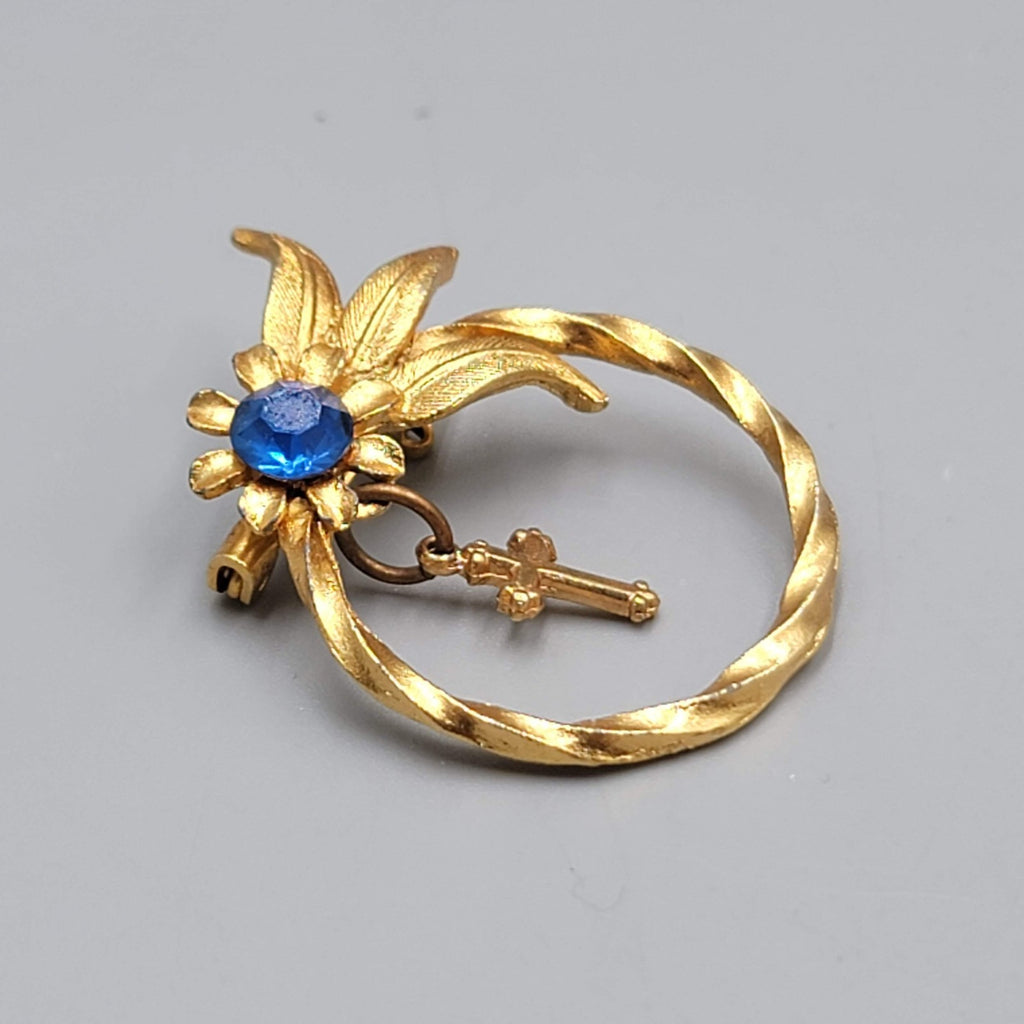 Vintage Cross Bow Blue Rhinestone Brooch Gold tone Dangle 1.25"