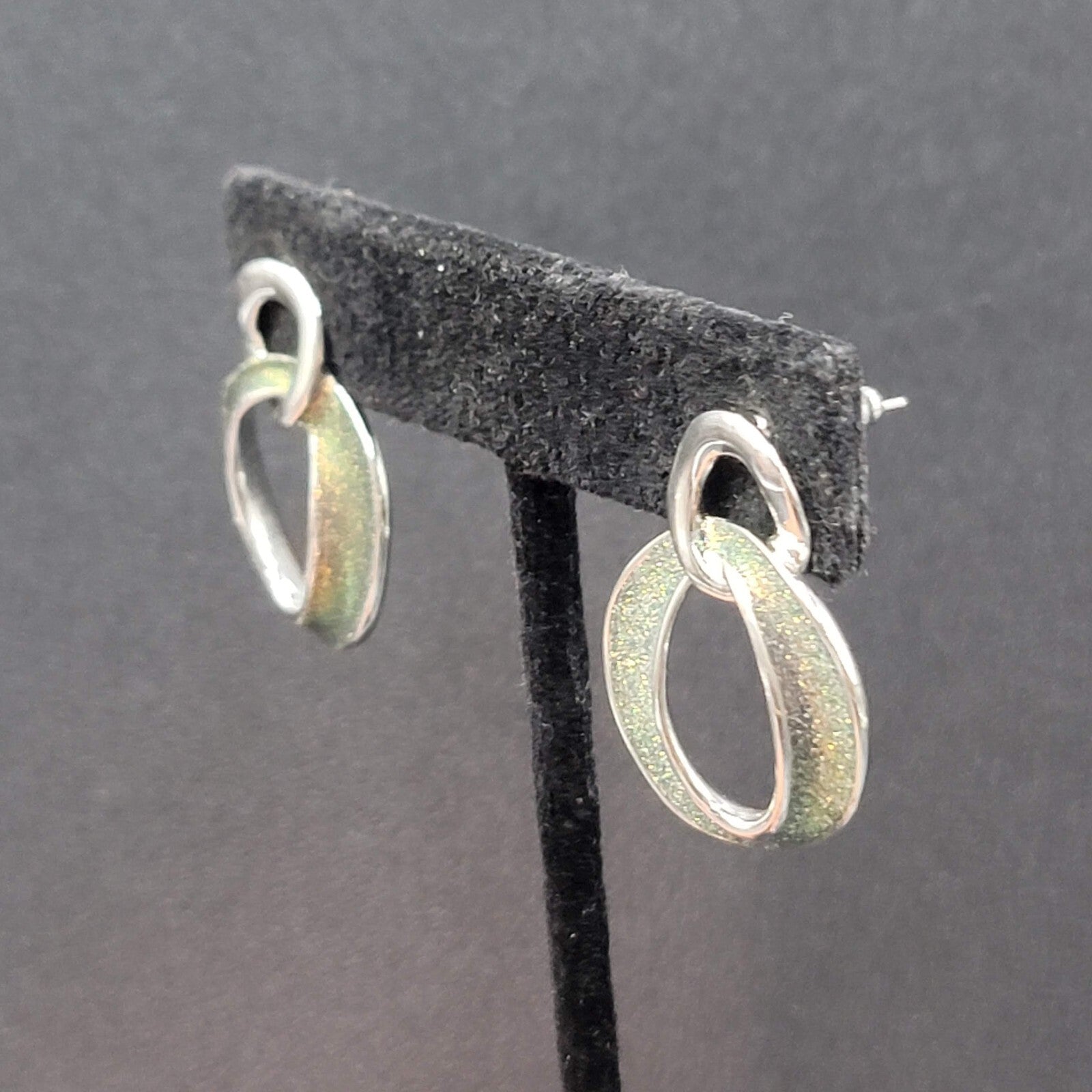 Pierced Earrings Silver tone Iridescent Glitter Interlocking Rings Drop 1 1/8"
