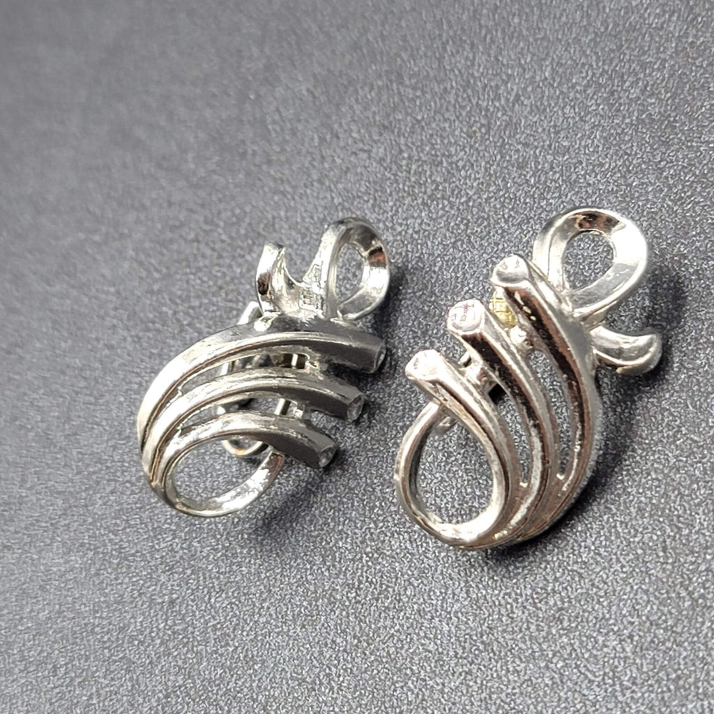 Vintage Clip on Earrings Pat Pend Silver tone Swirl Climber 1.25"