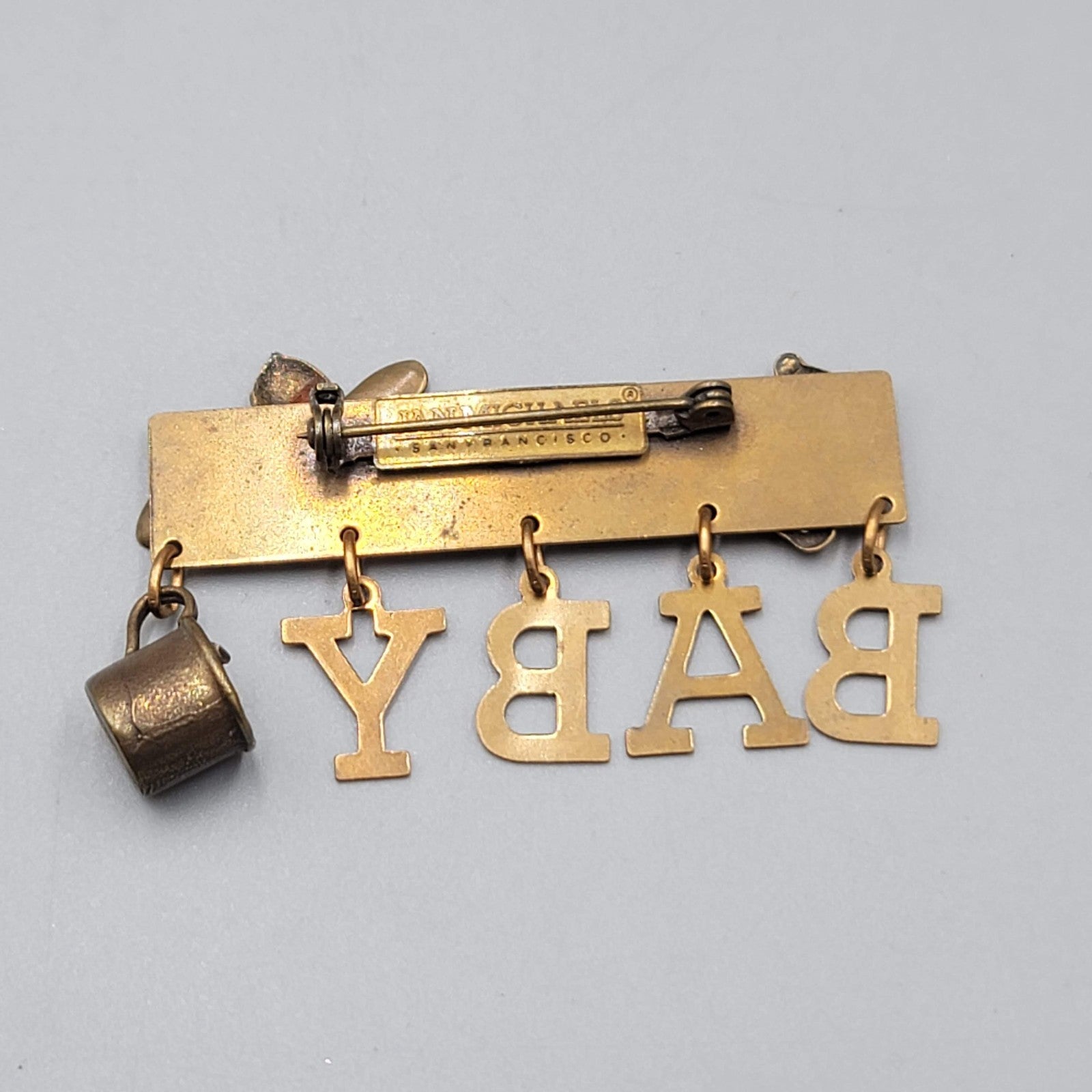 Jan Michaels San Francisco Brooch BABY Charm Dangle Brass 2.25"