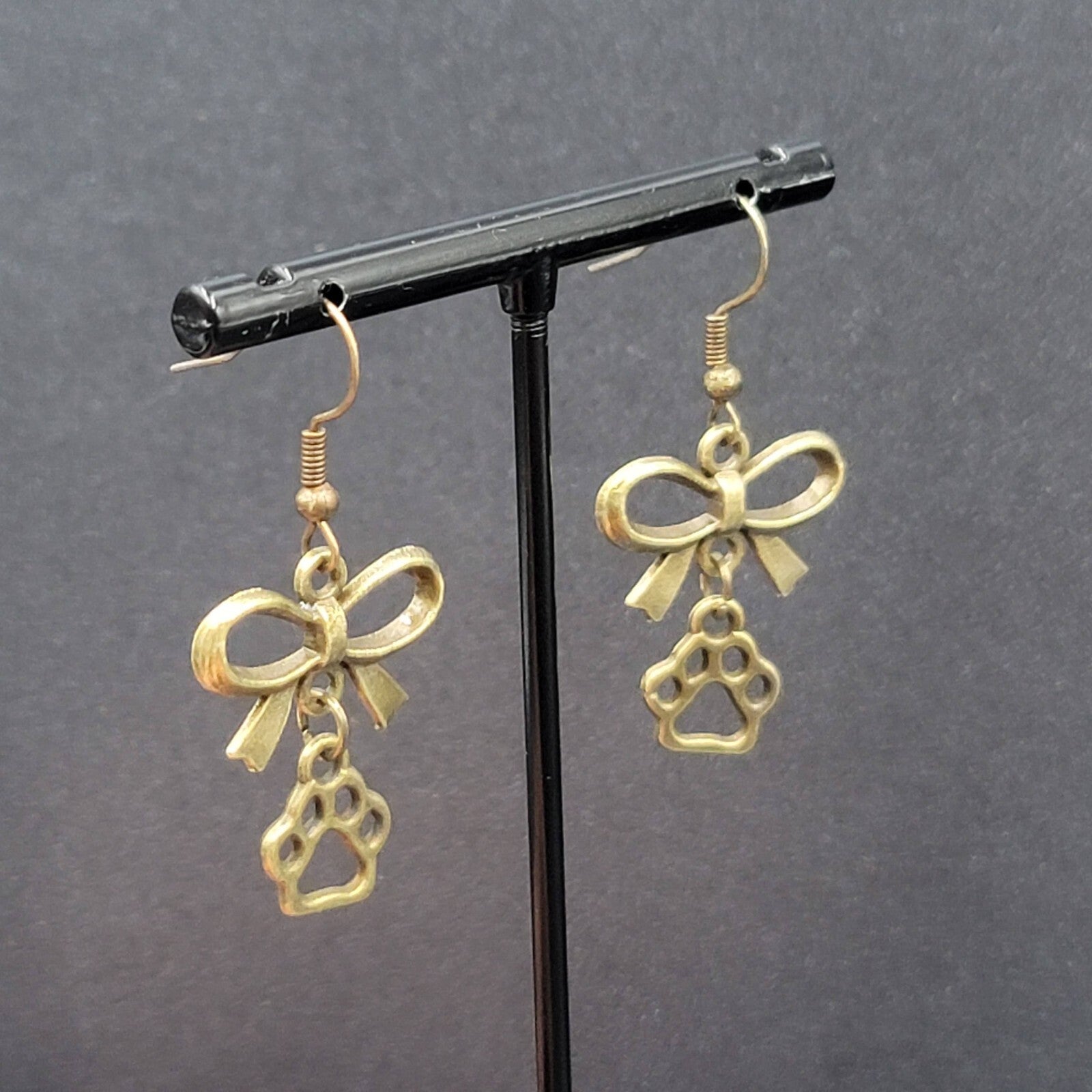 Pierced Bow Dog Paws Earrings Bronze tone Dangle 7/8"